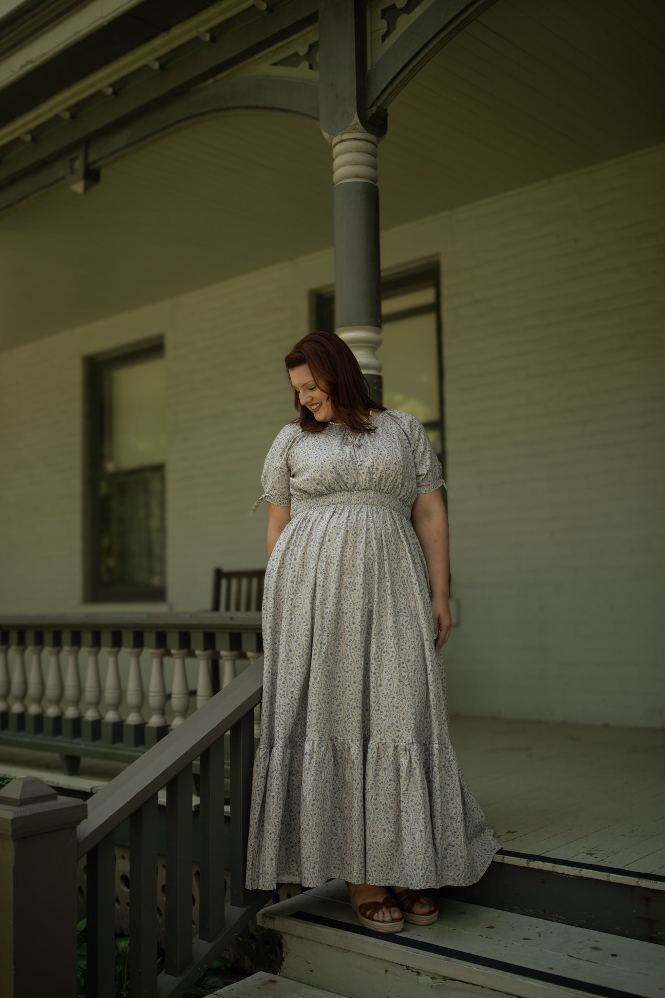 woman in patterned modest nursing dress