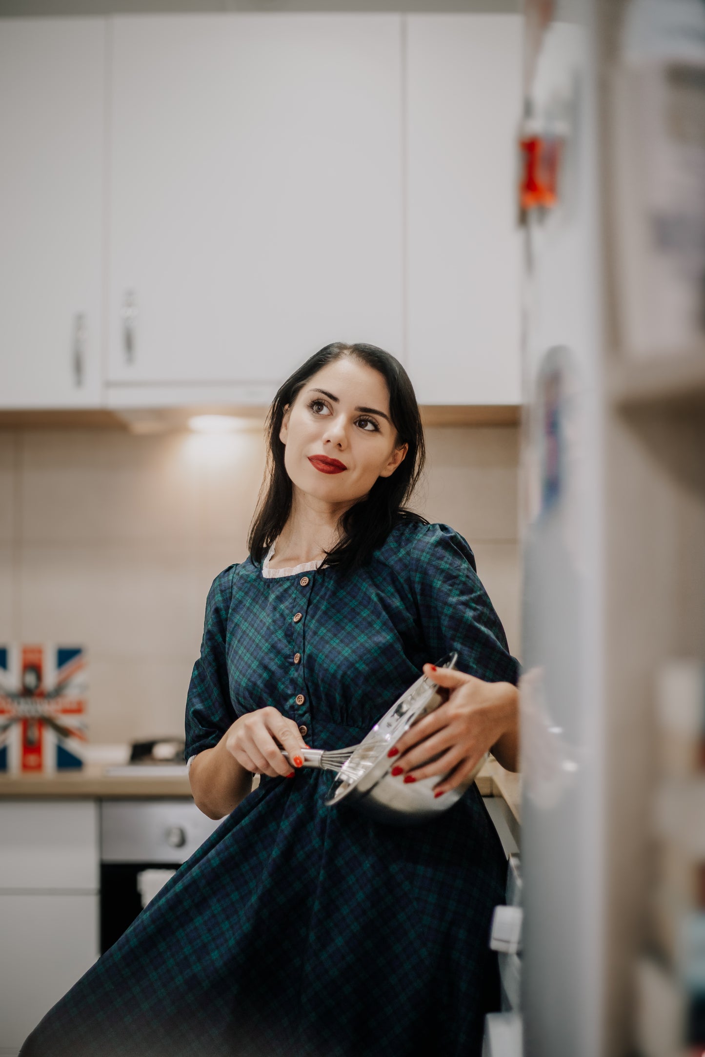 woman wearing a modest nursing blue patterned dress