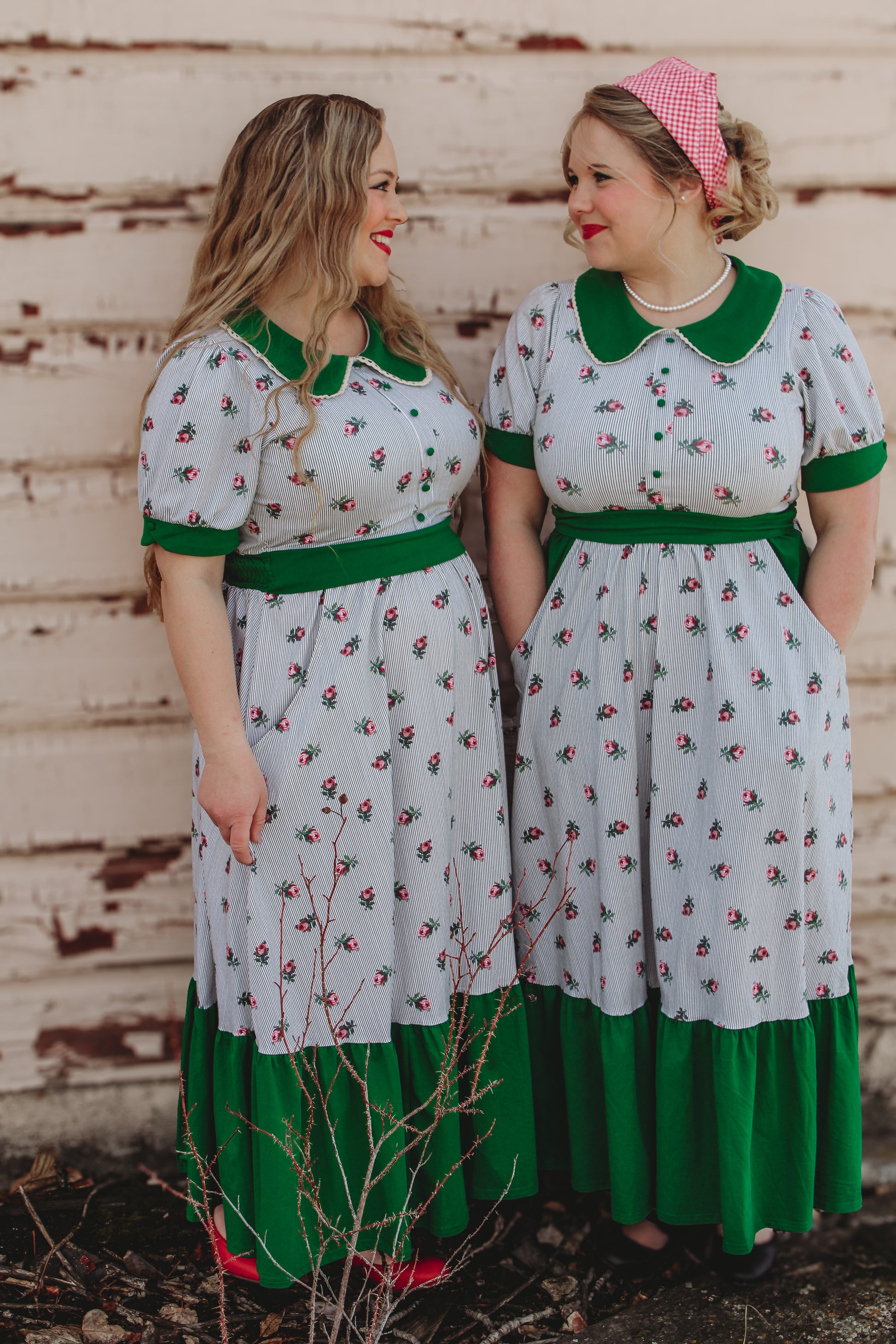 women wearing green and white striped modest nursing dresses