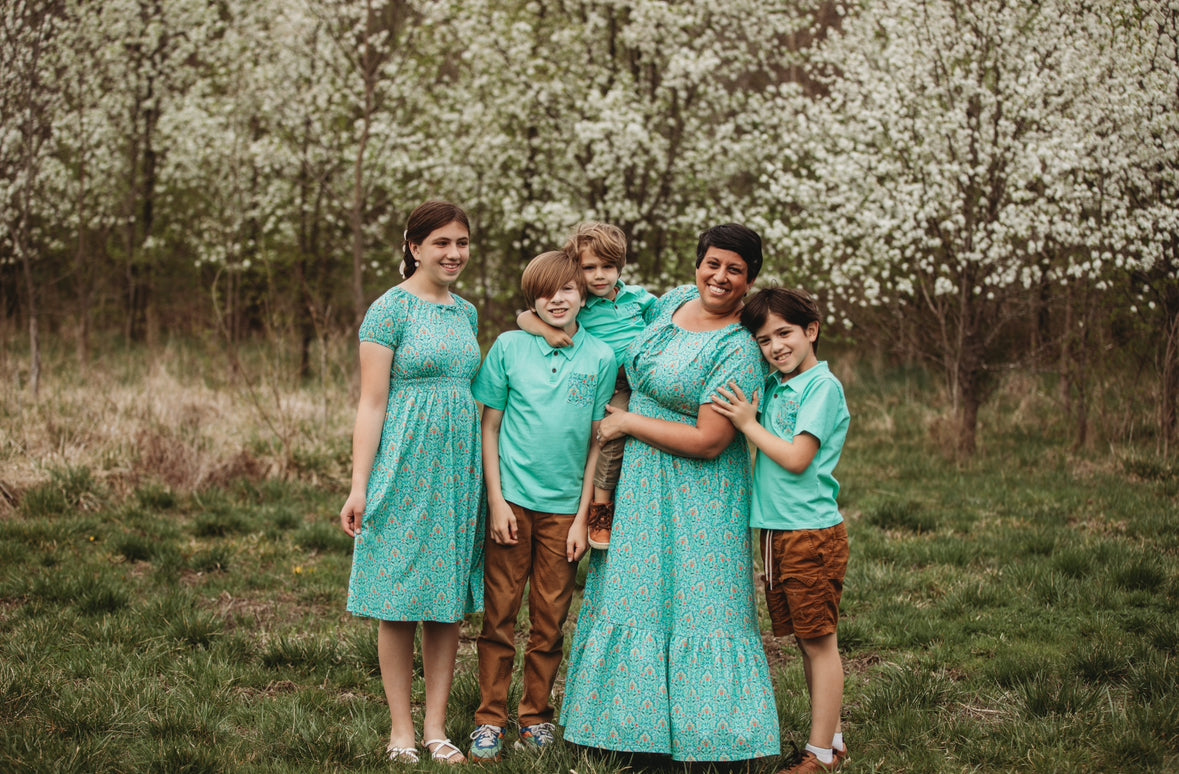 family wearing green outfits