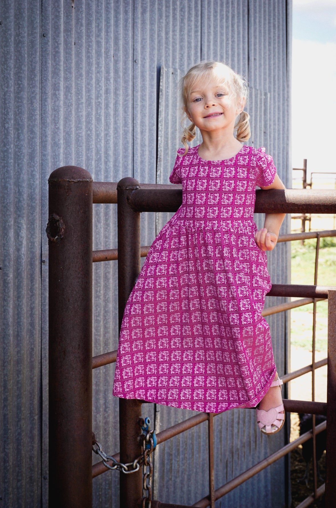 Young girl in a modest pink dress