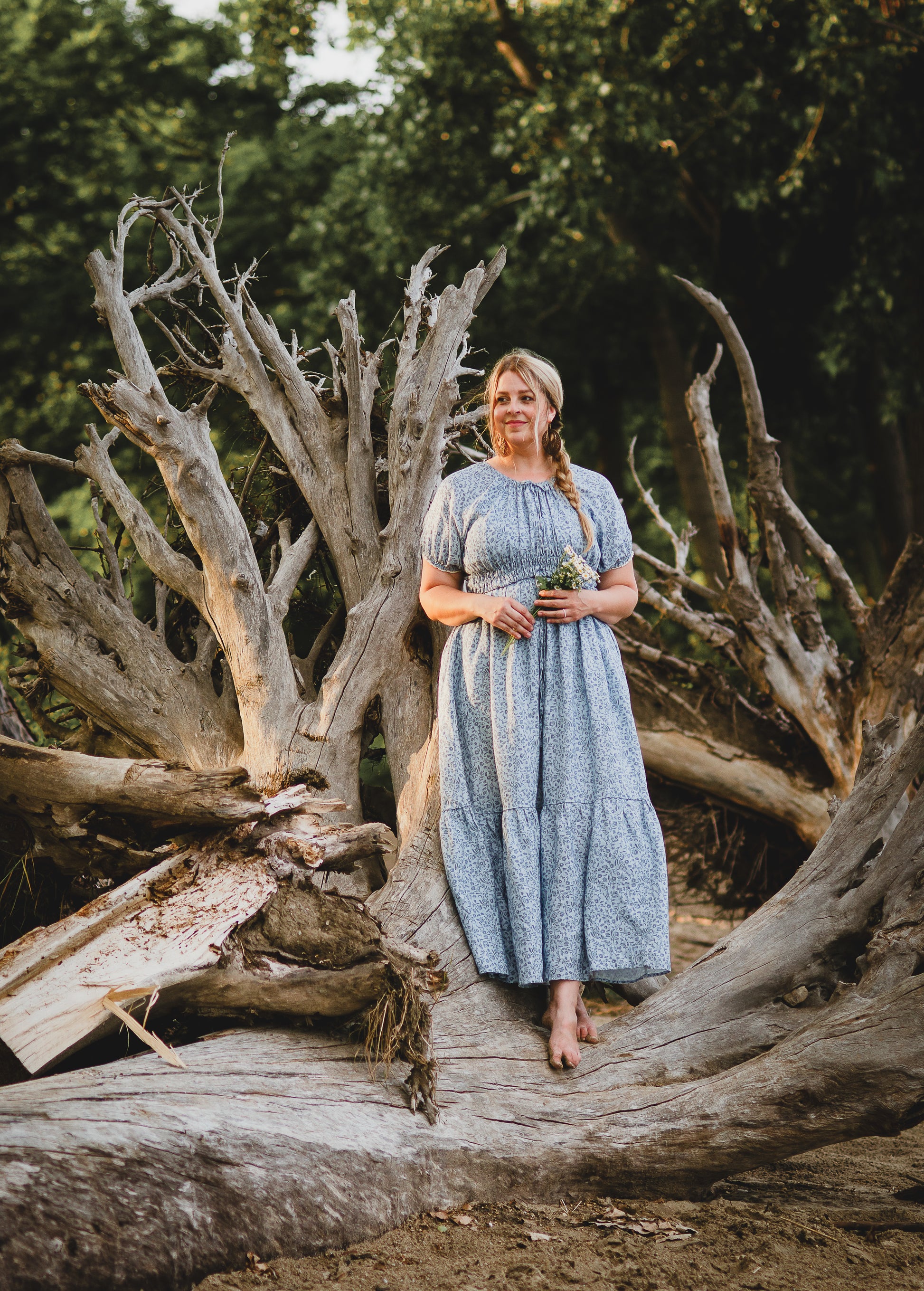 woman in a modest blue nursing dress