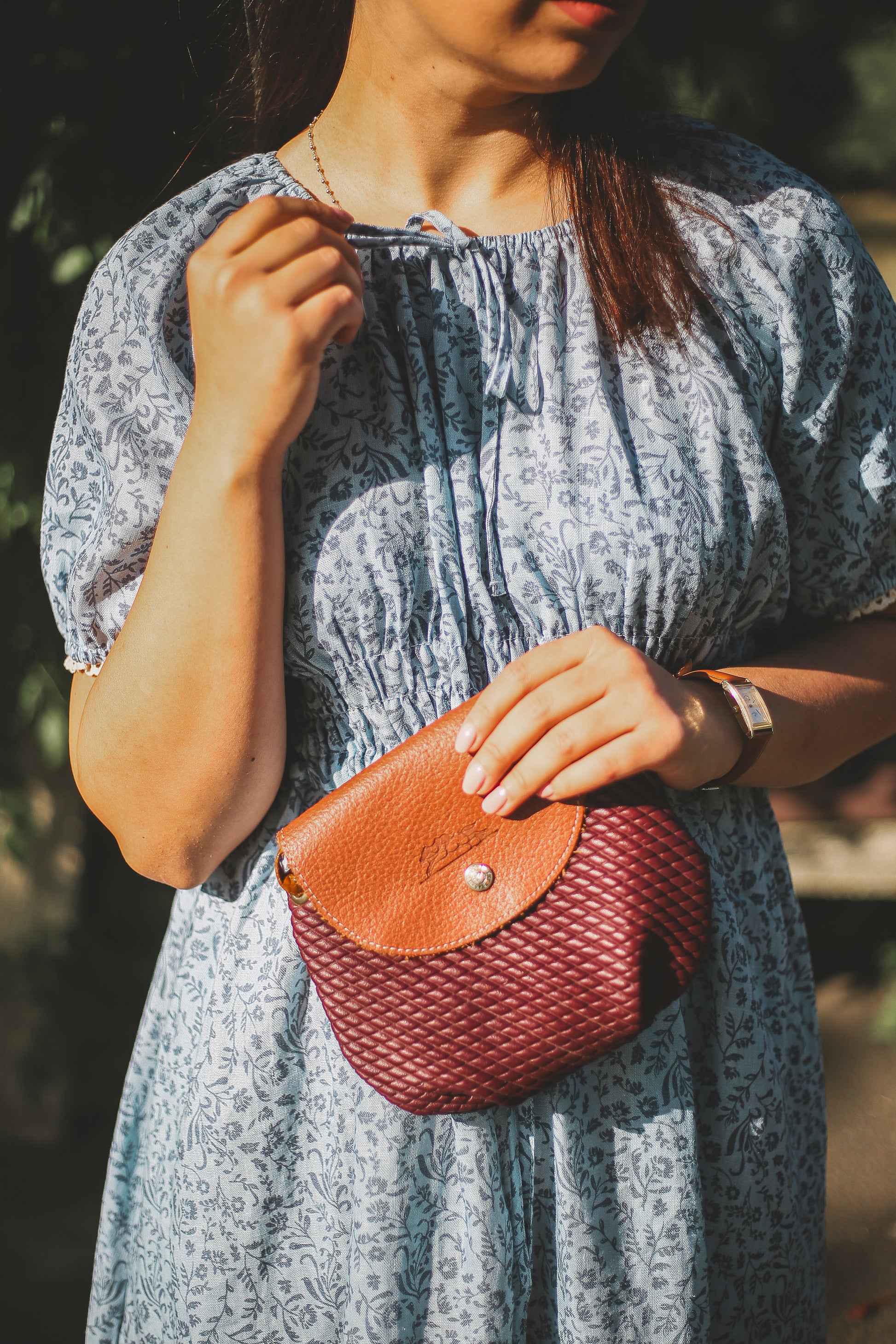 woman in a modest blue nursing dress