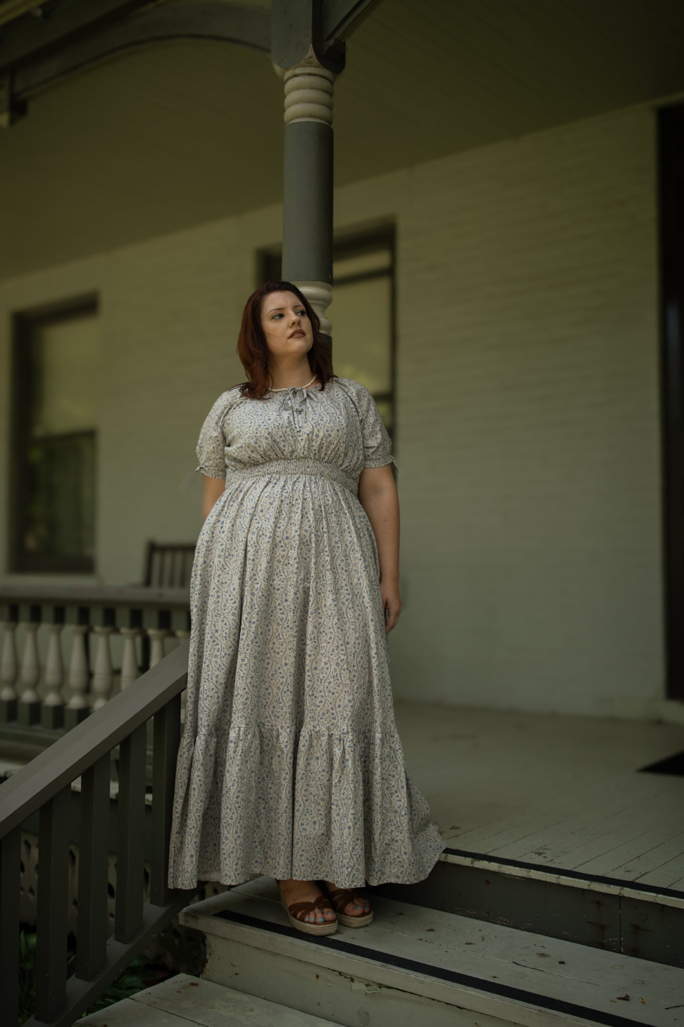 woman in patterned modest nursing dress
