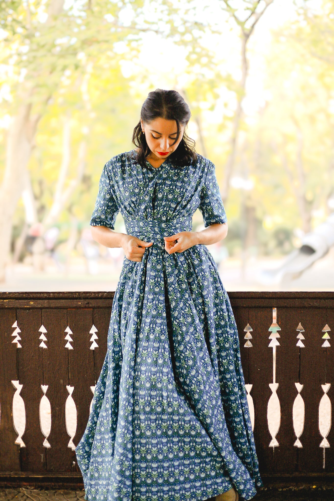 Woman in modest nursing dress outdoors