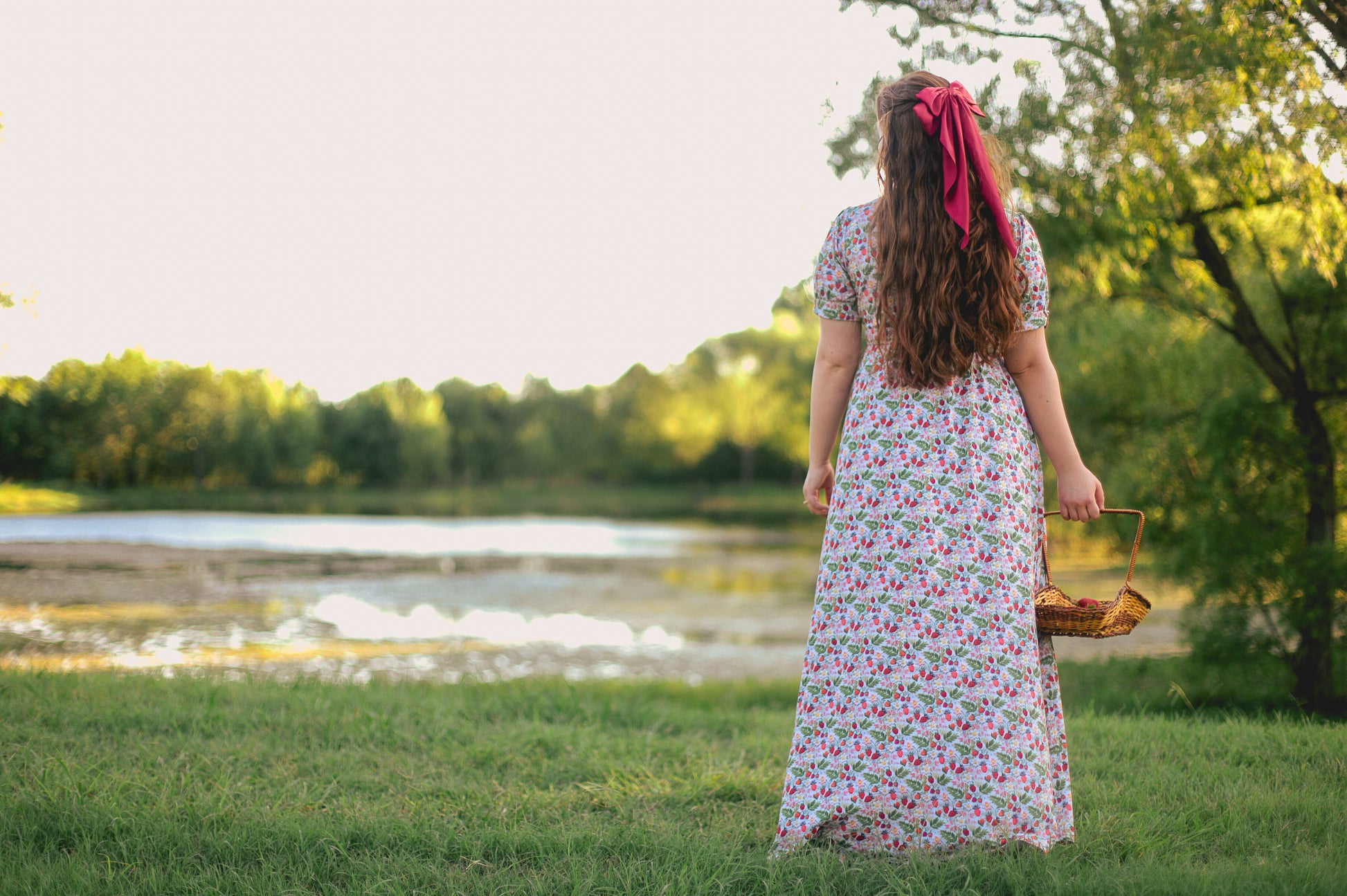 Woman in a floral modest nursing dress.