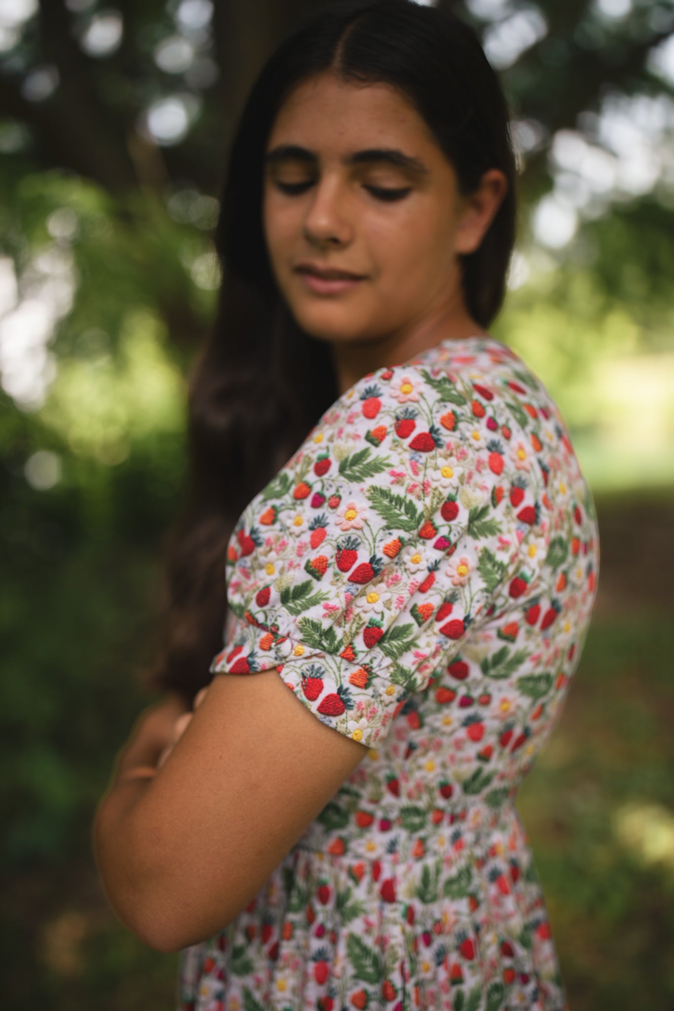 Woman in a floral modest nursing dress