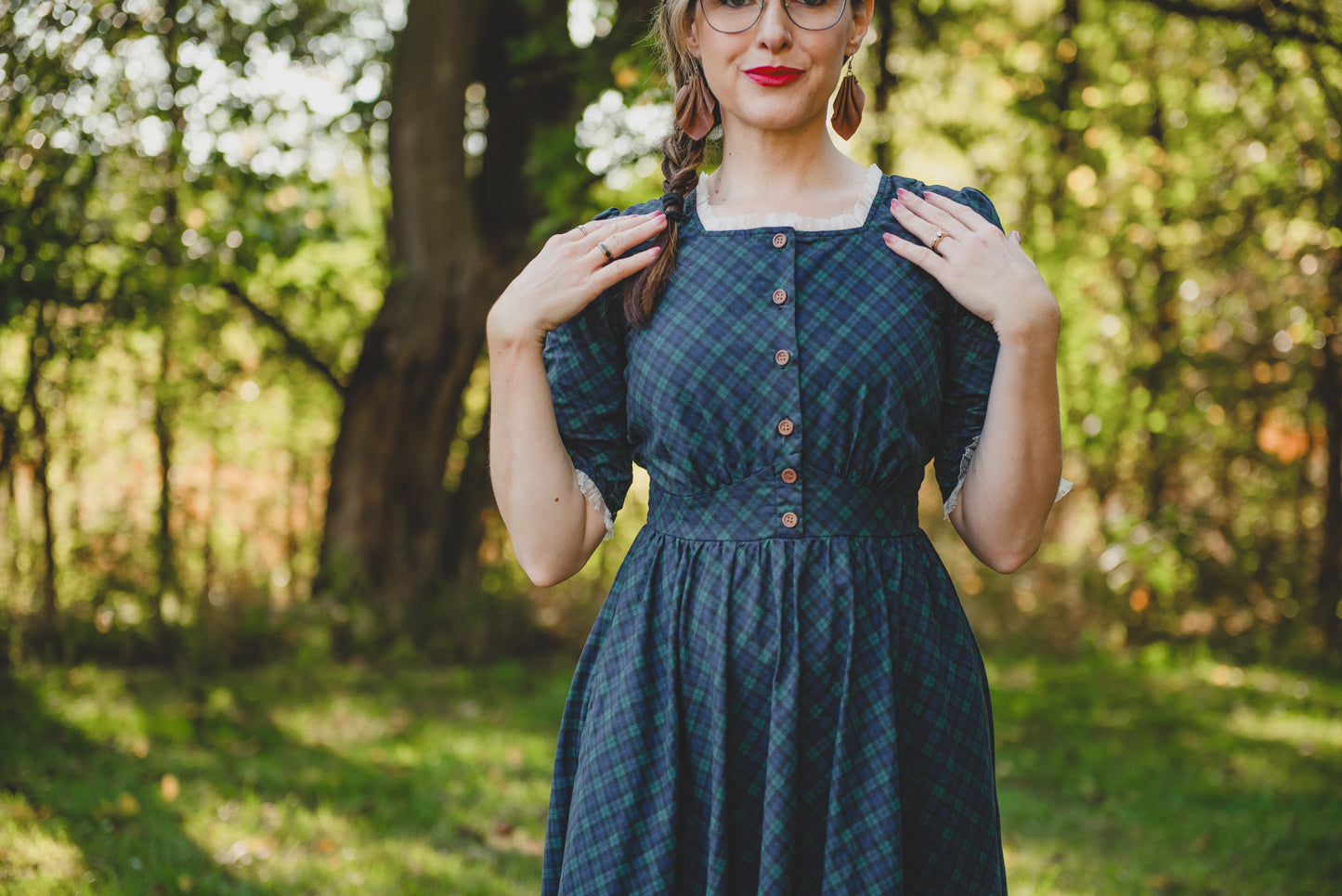 woman wearing a modest nursing blue patterned dress
