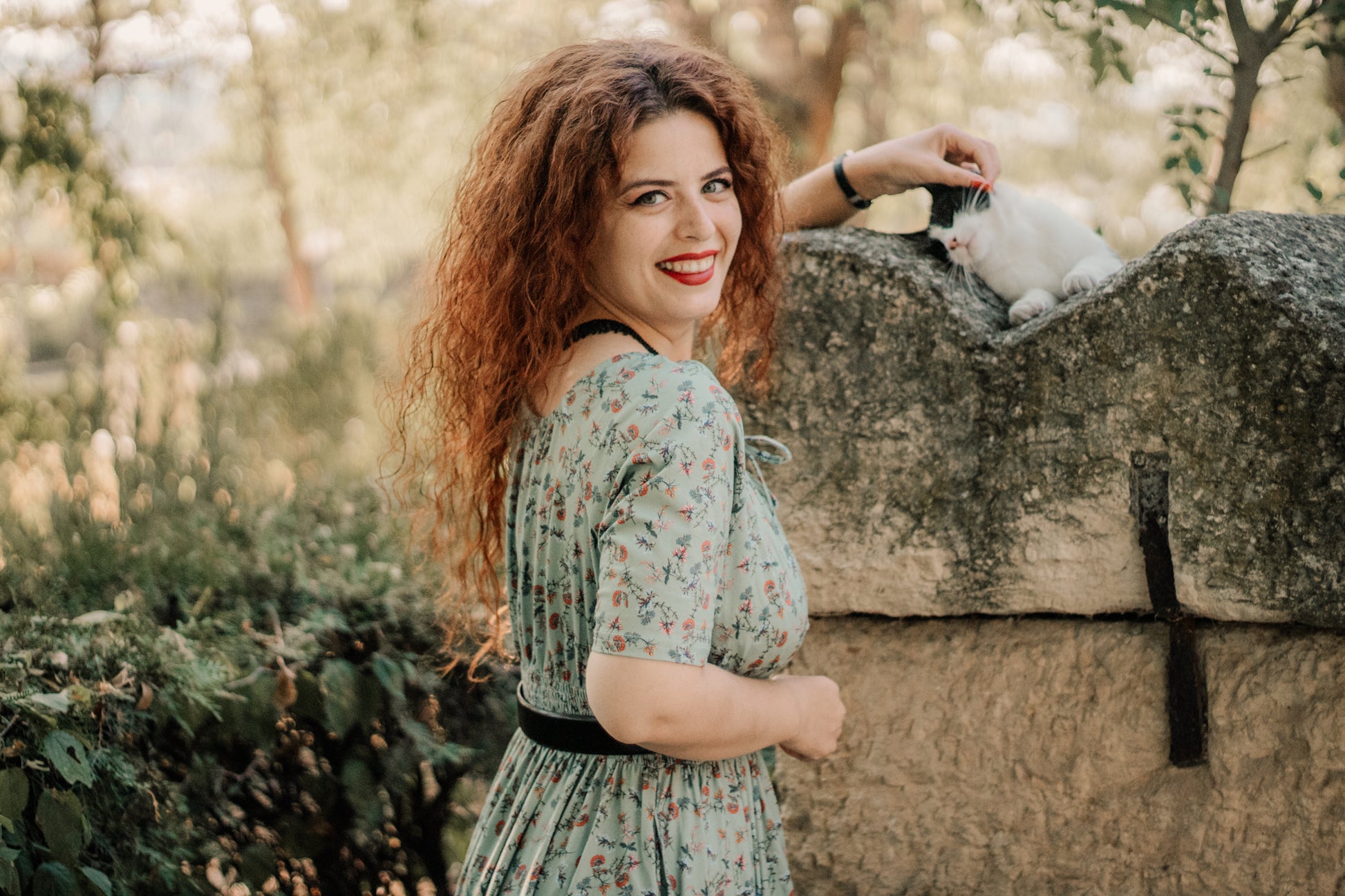 Woman in modest nursing dress outdoors