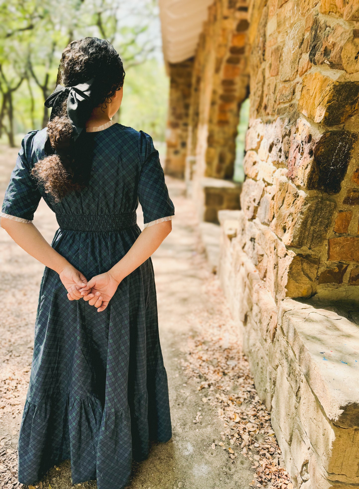 woman wearing a modest nursing blue patterned dress