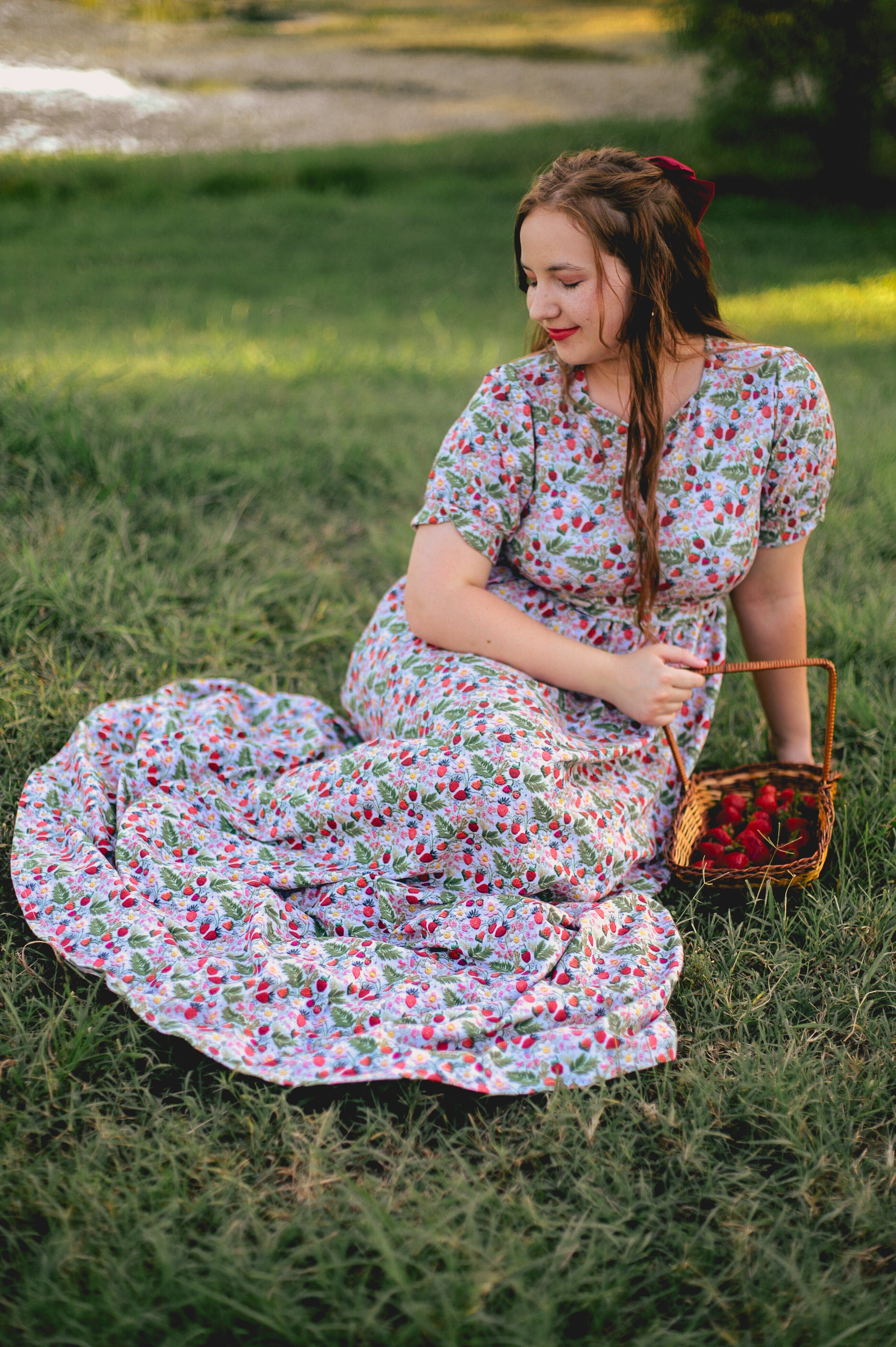 Woman in a floral modest nursing dress