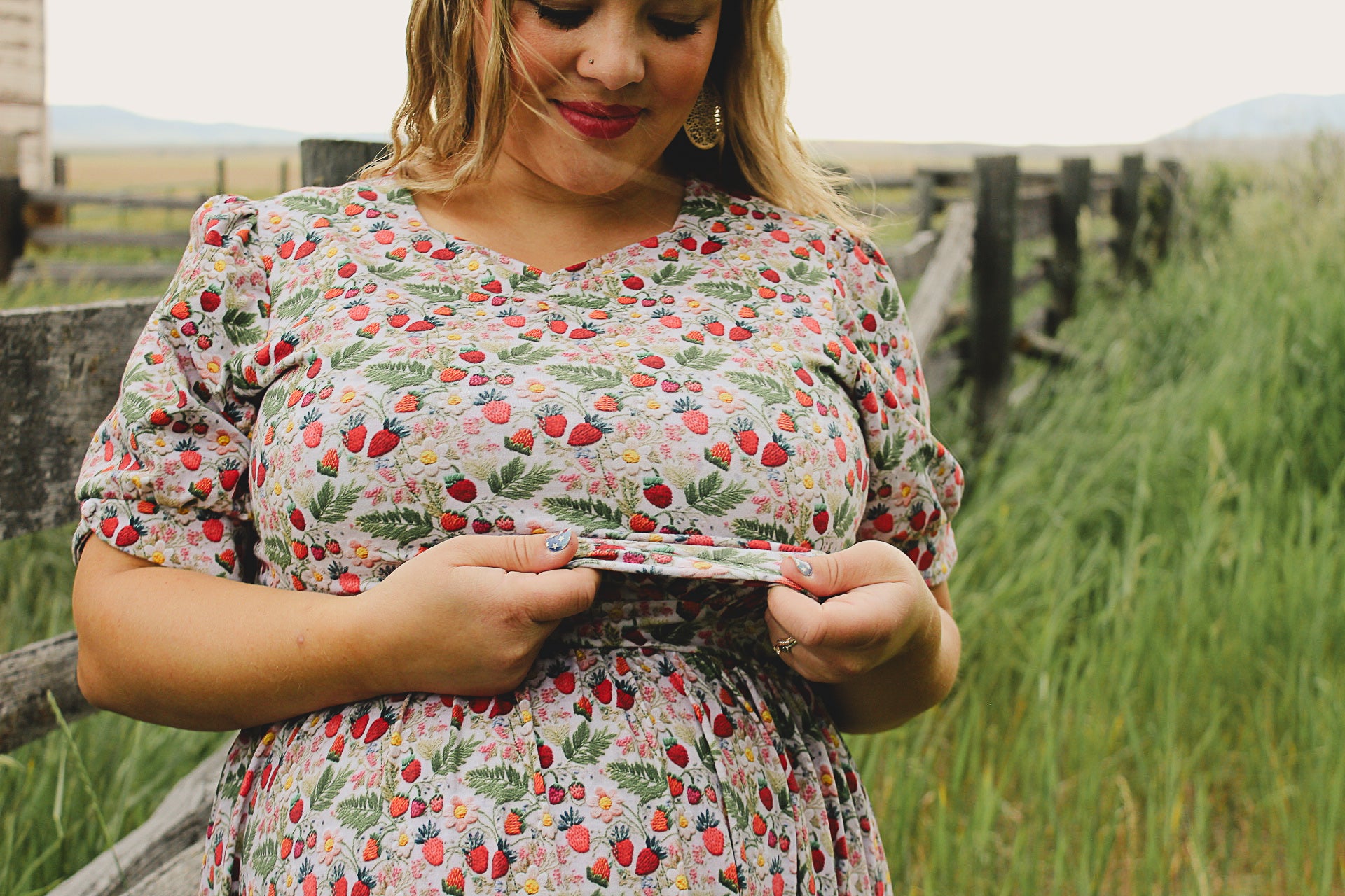 Woman in a floral modest nursing dress