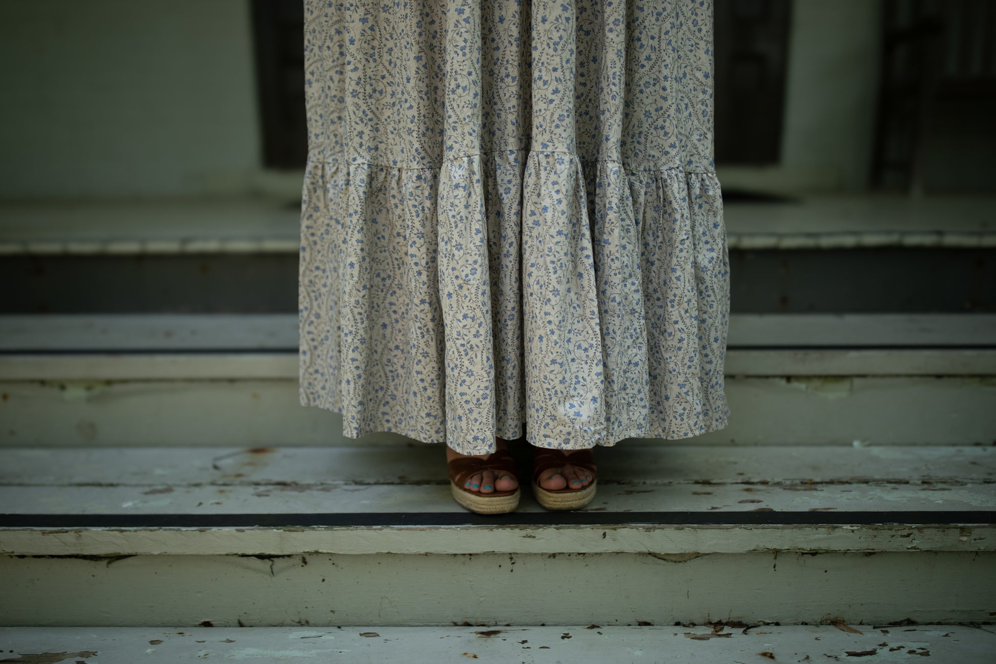 woman in patterned modest nursing dress