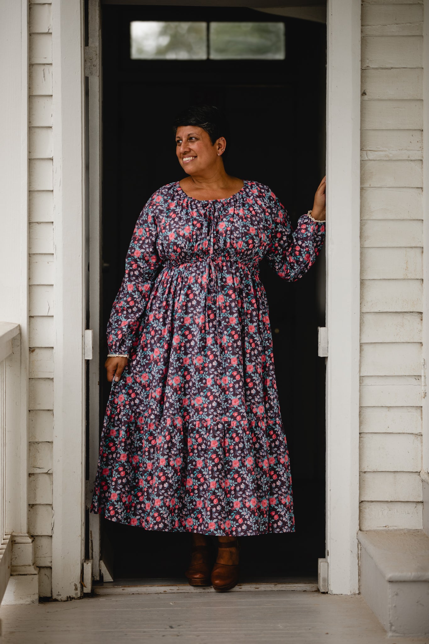 Woman in modest nursing floral dress outdoors