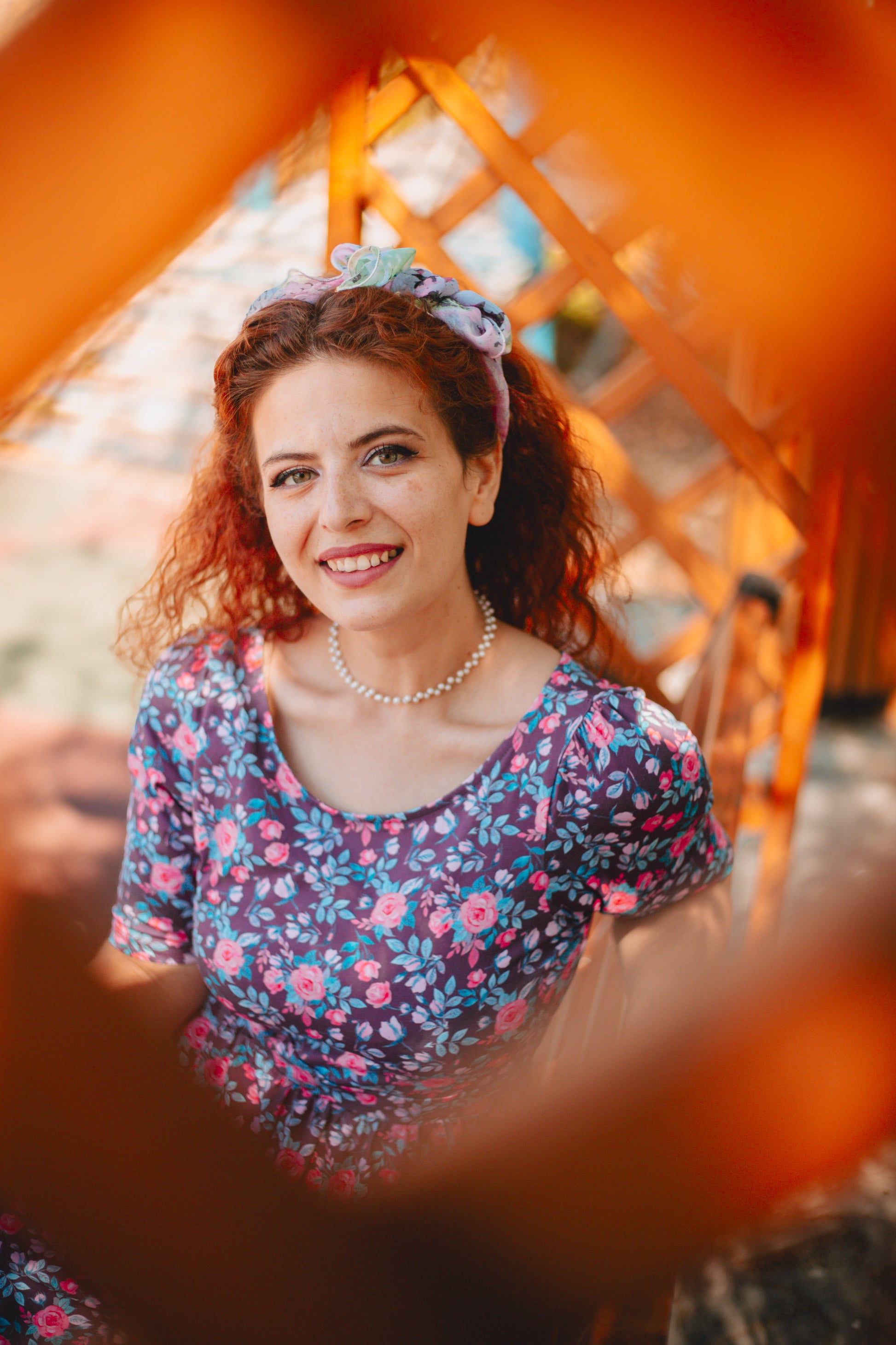 woman wearing a modest nursing floral dress