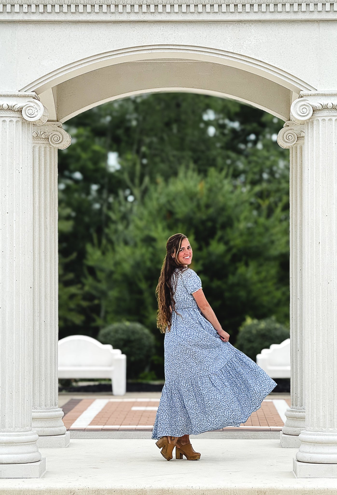 woman in a modest blue nursing dress