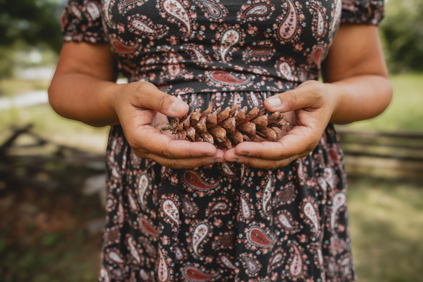 woman wearing a modest nursing floral dress