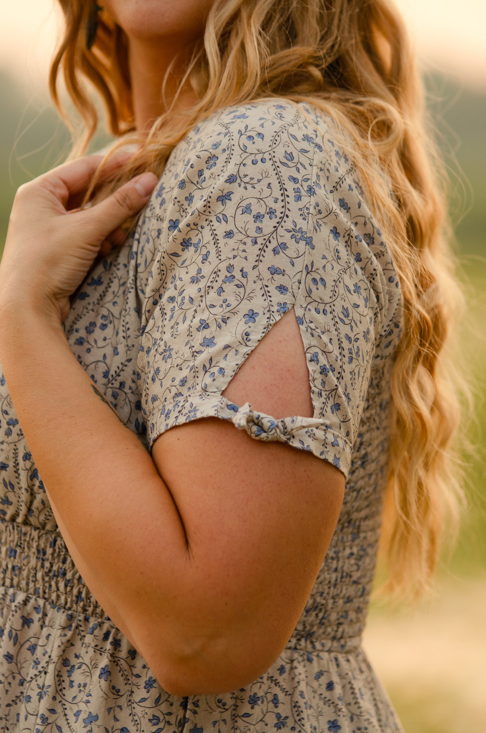 woman in patterned modest nursing dress