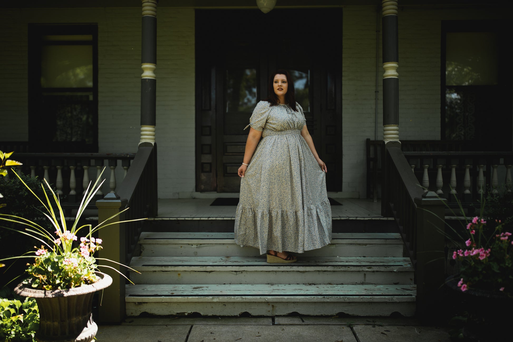woman in patterned modest nursing dress
