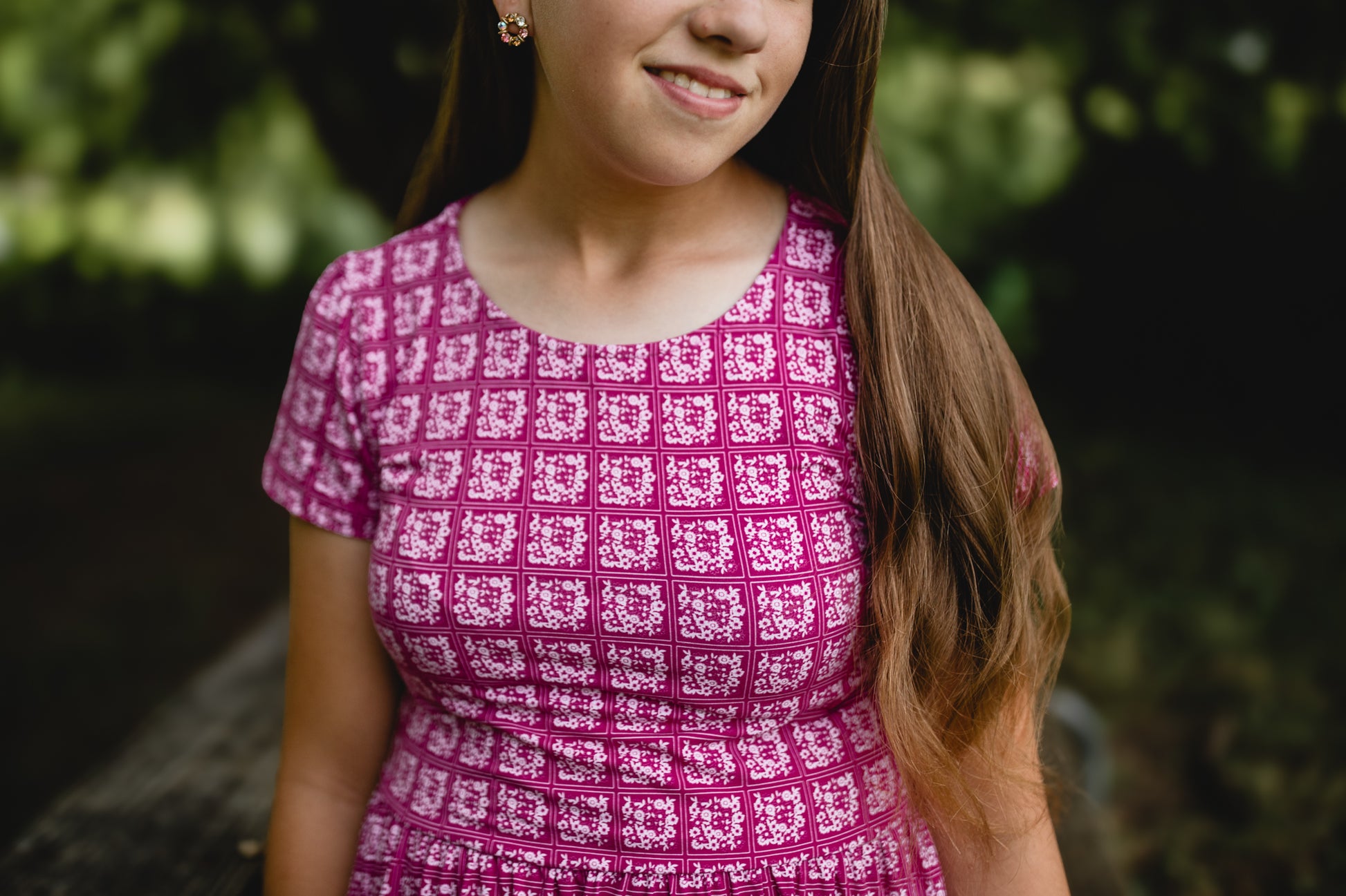 Young girl in a modest pink dress