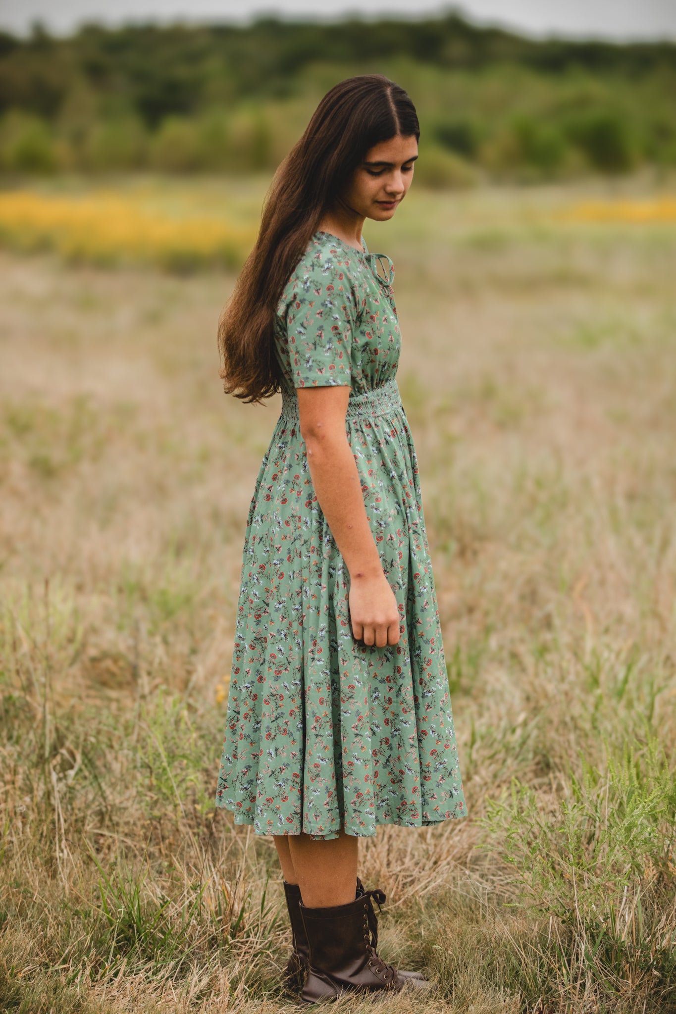 Woman in modest nursing floral dress