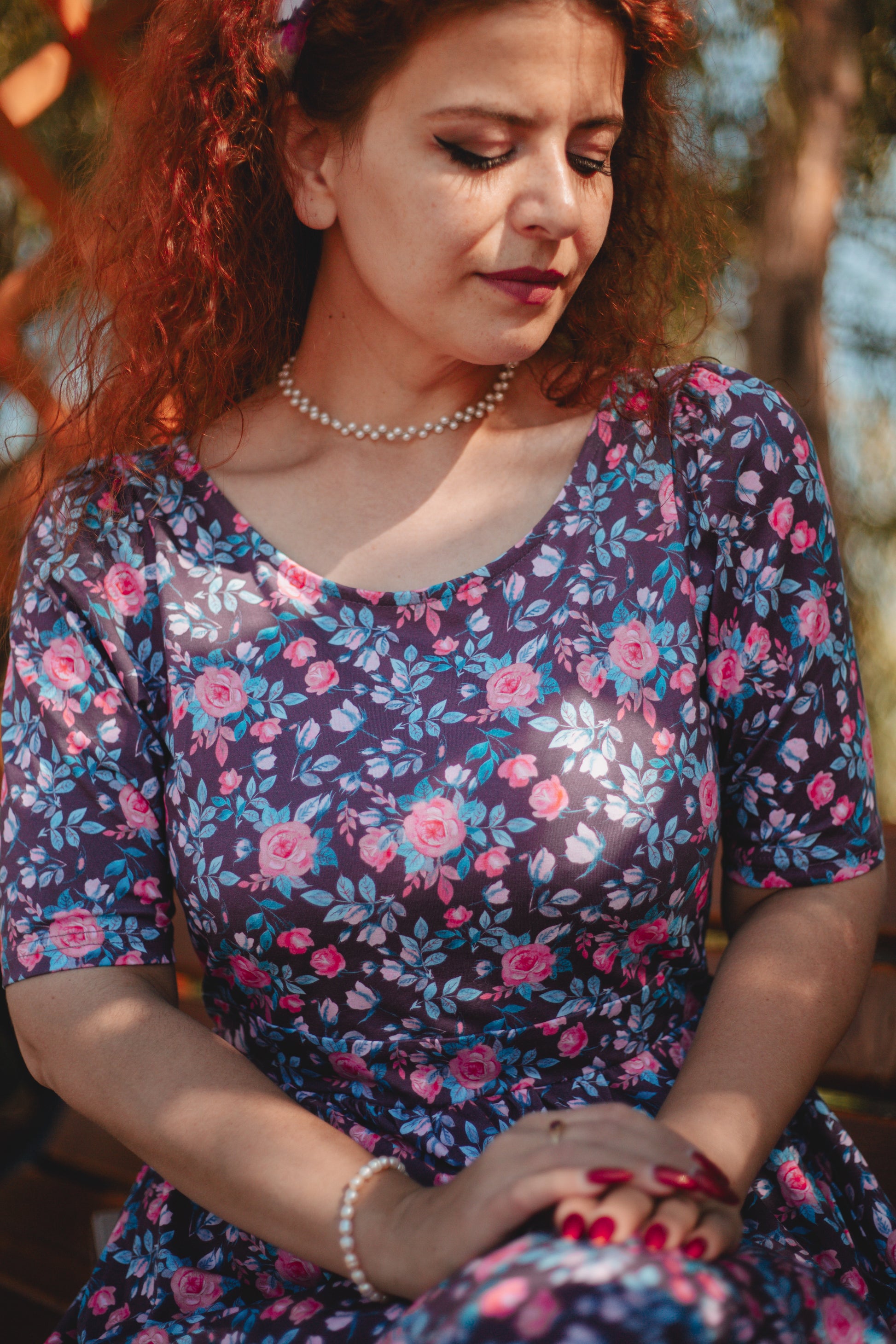 woman wearing a modest nursing floral dress