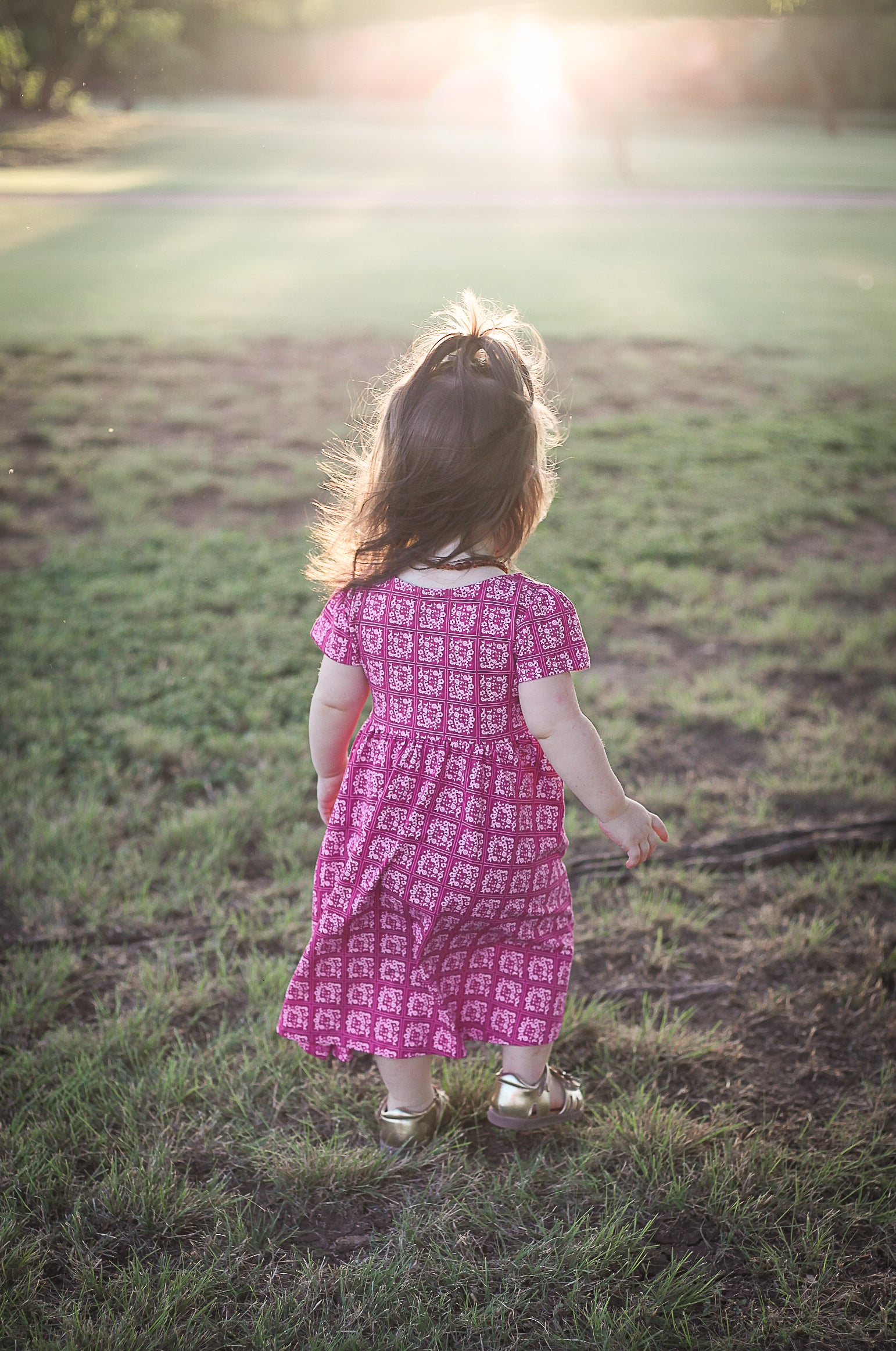Young girl in a modest pink dress