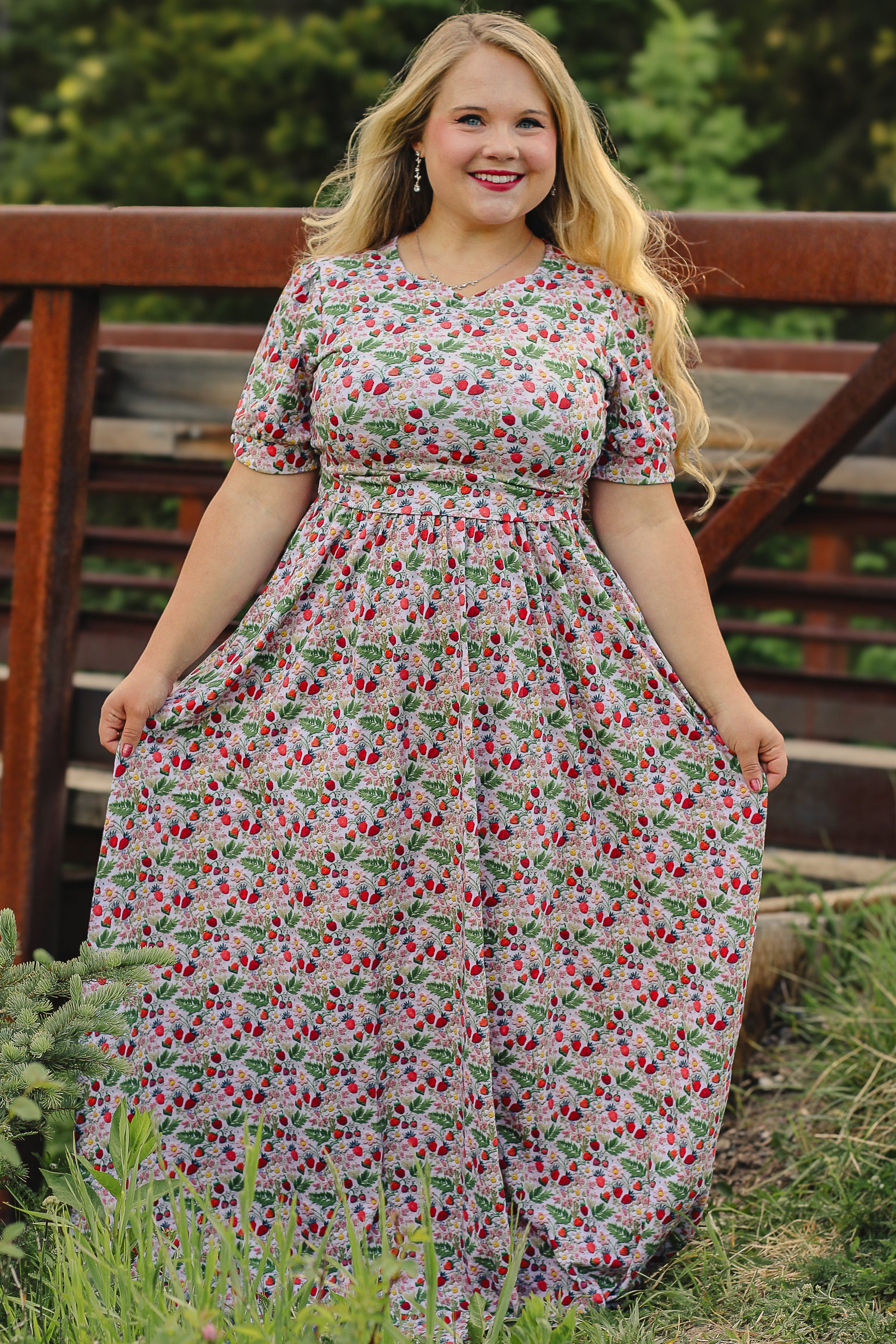 Woman in a floral modest nursing dress