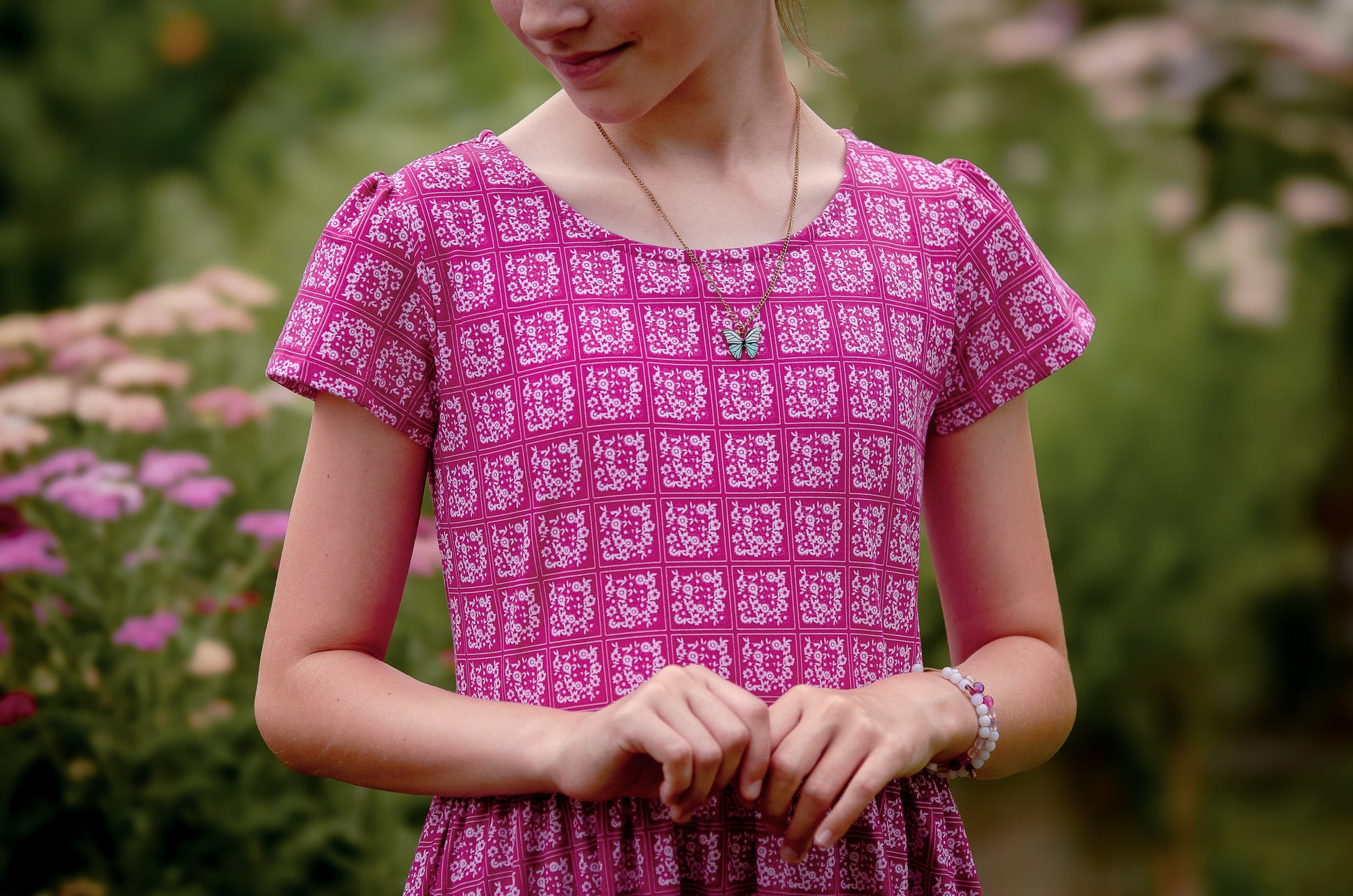 Young girl in a modest pink dress