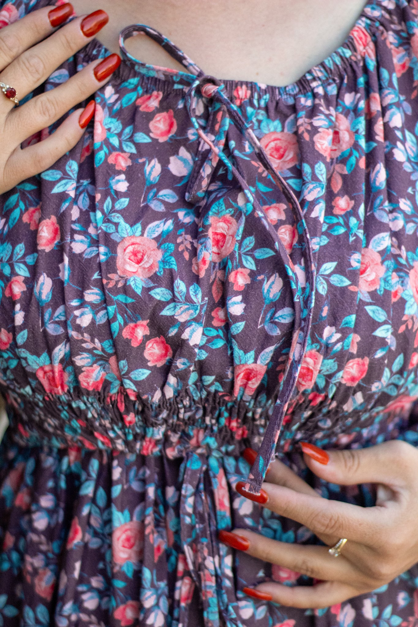 Close-up of modest nursing floral dress