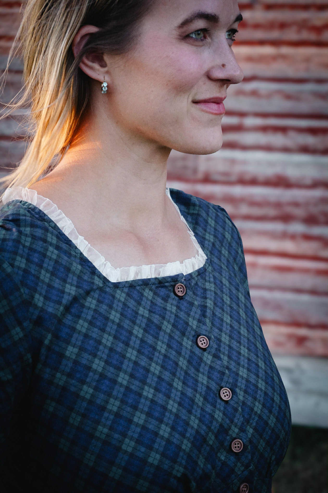 woman wearing a modest nursing blue patterned dress