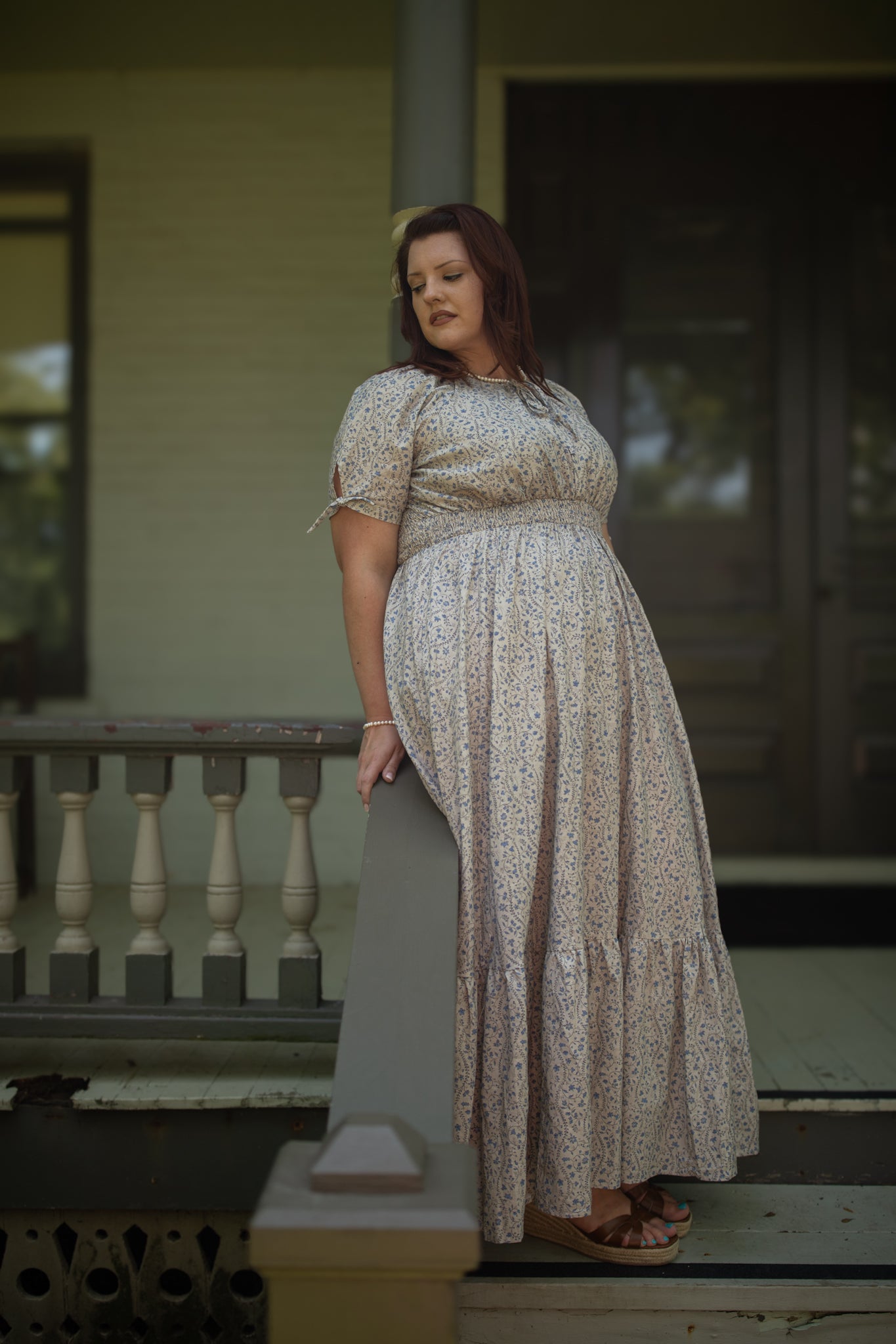 woman in patterned modest nursing dress