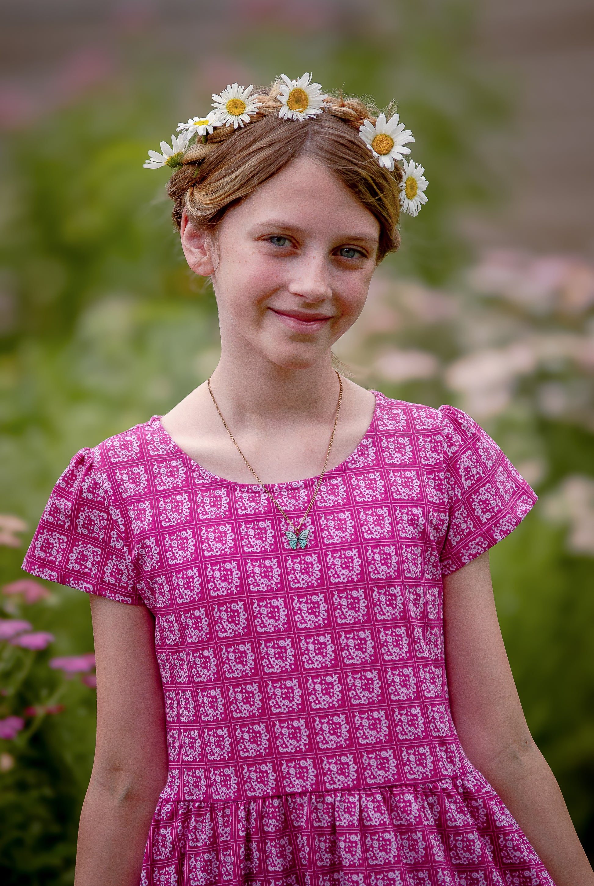 Young girl in a modest pink dress