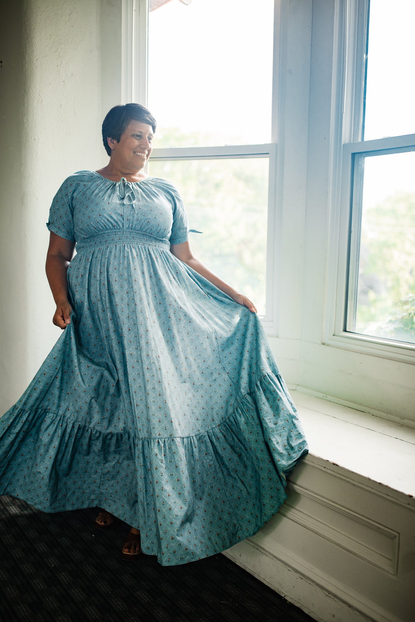 woman wearing a modest nursing dress