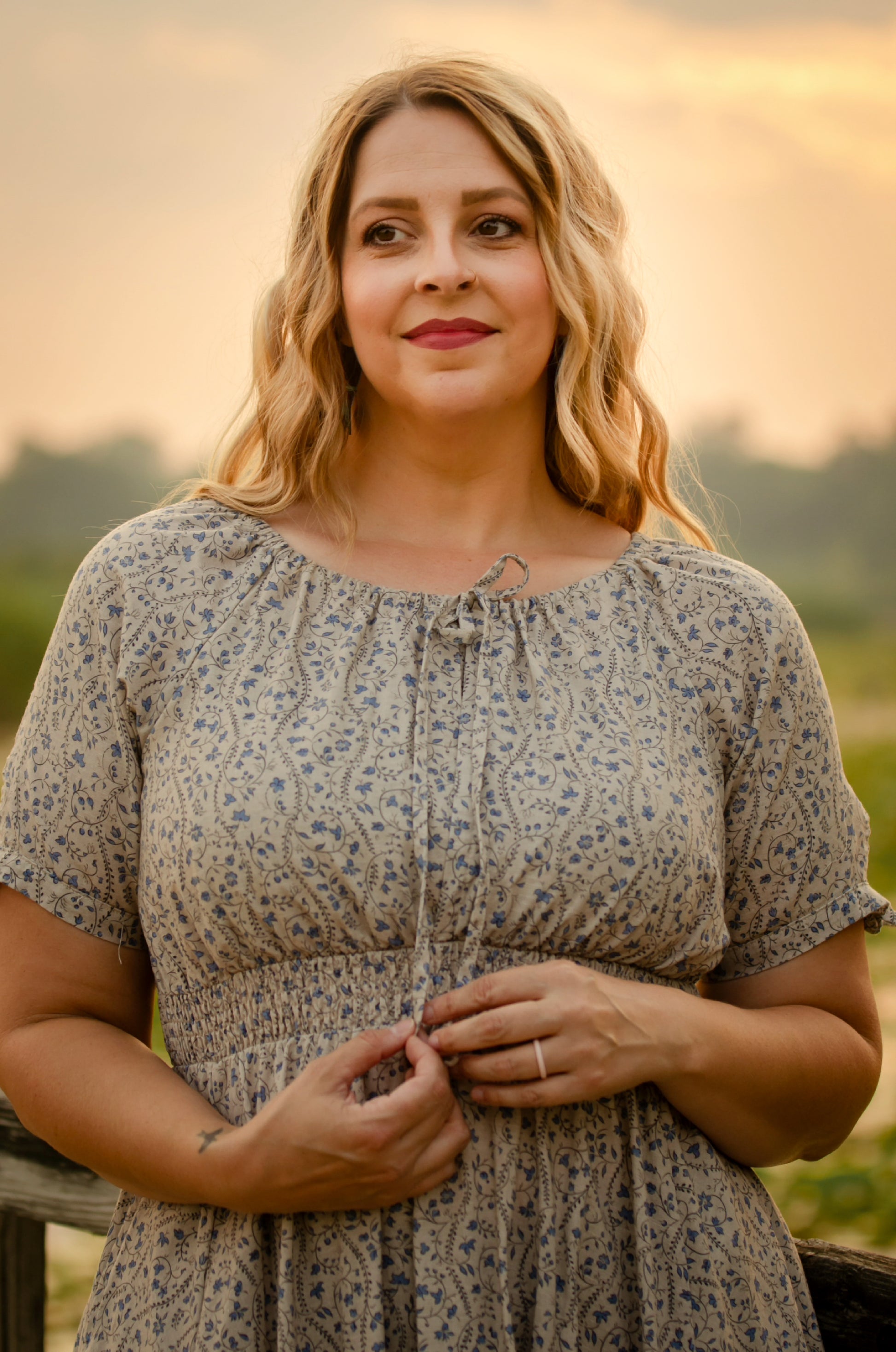 woman in patterned modest nursing dress