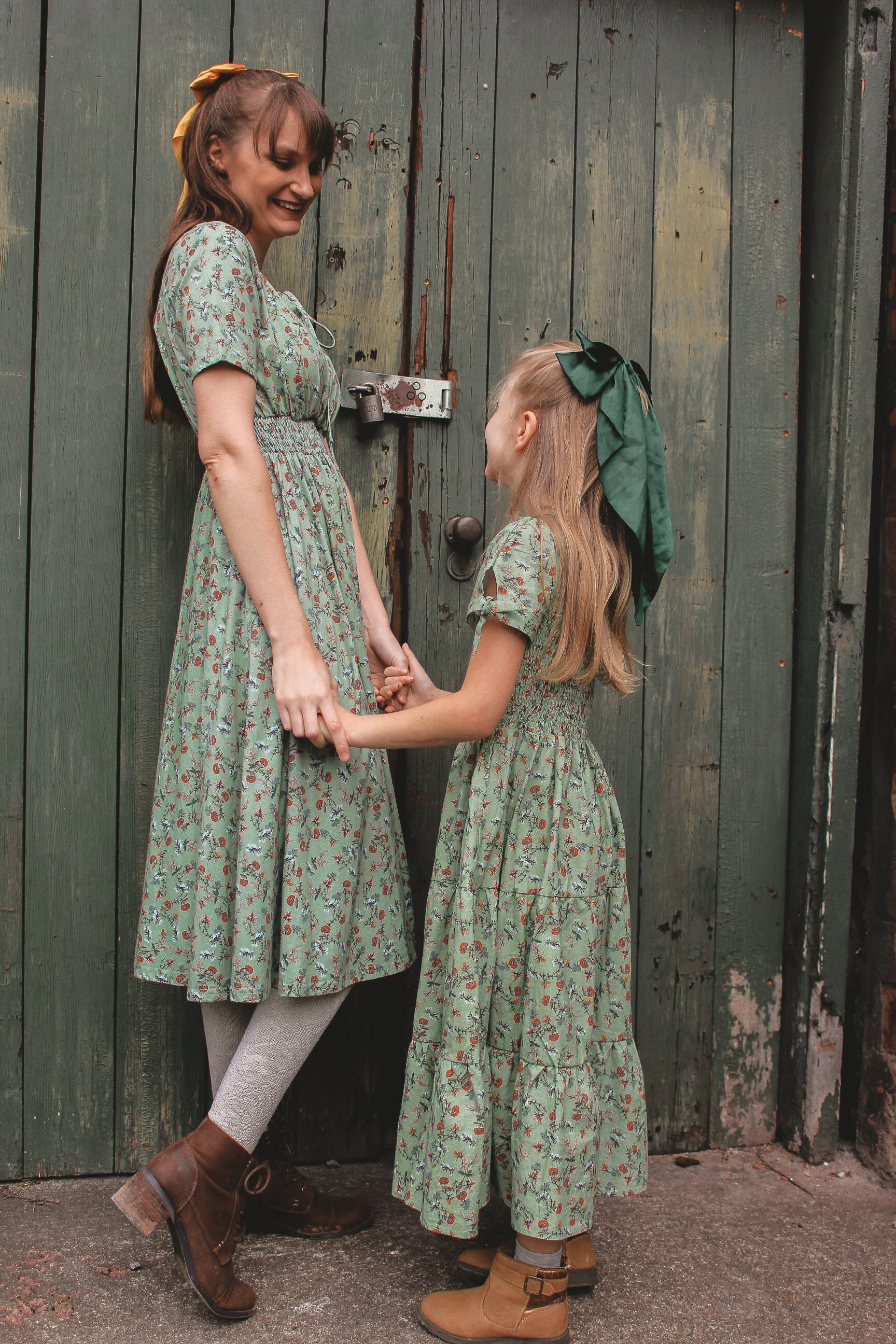 Woman in modest nursing floral dress outdoors