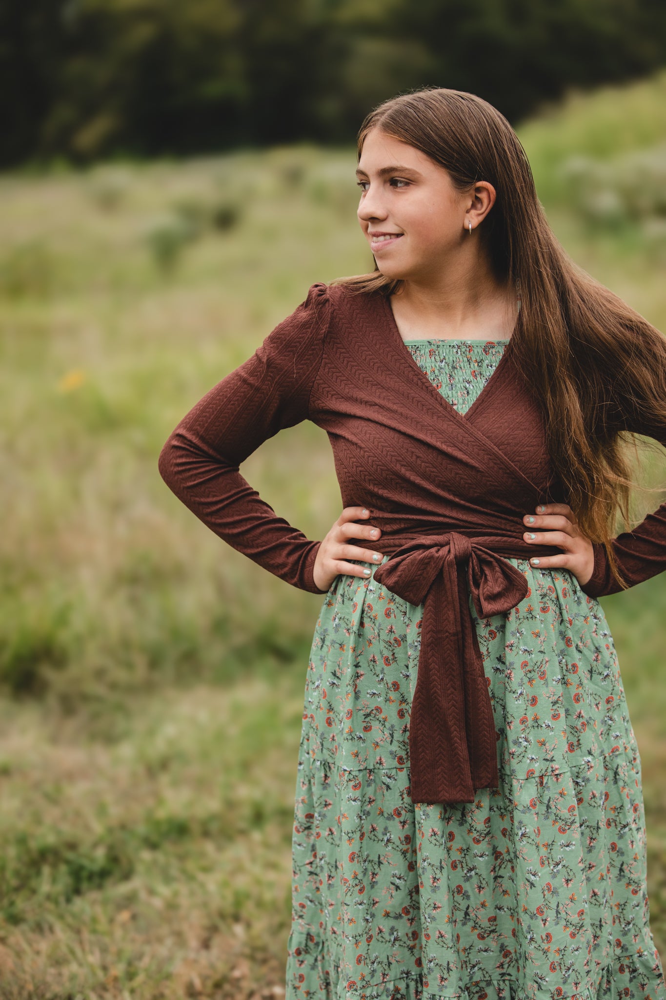 woman wearing a modest nursing green floral dress