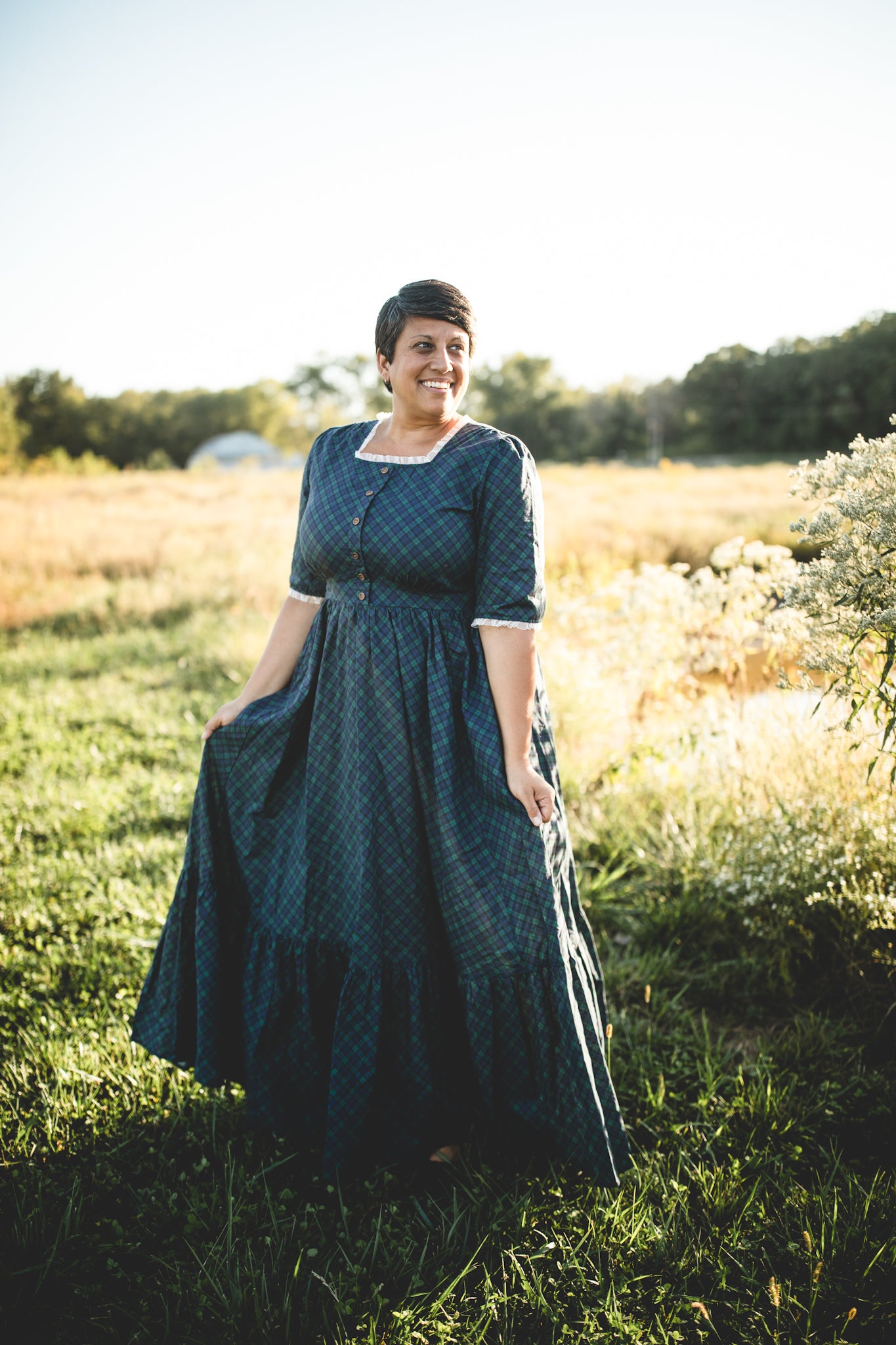 woman wearing a modest nursing blue patterned dress