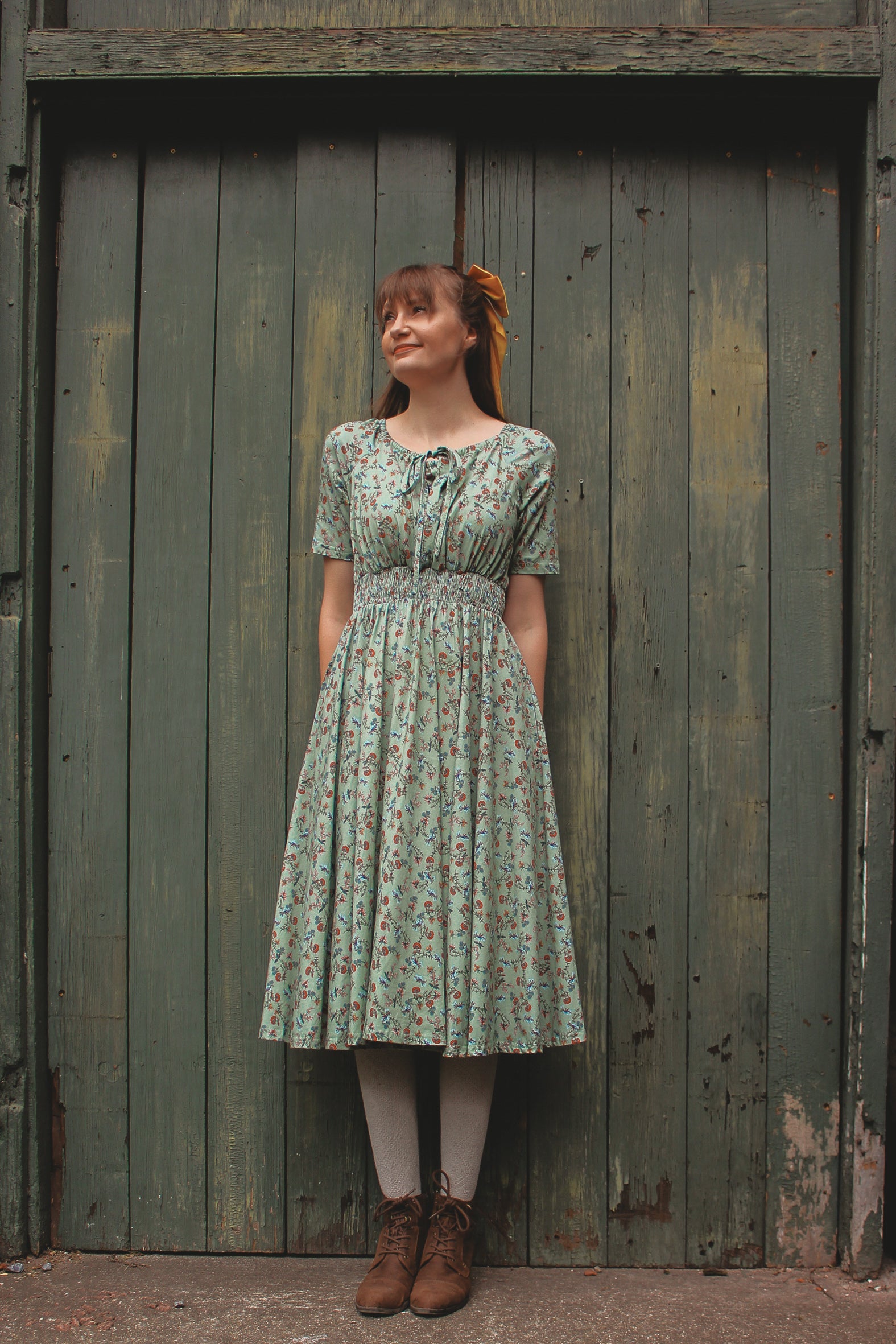 Woman in modest nursing floral dress