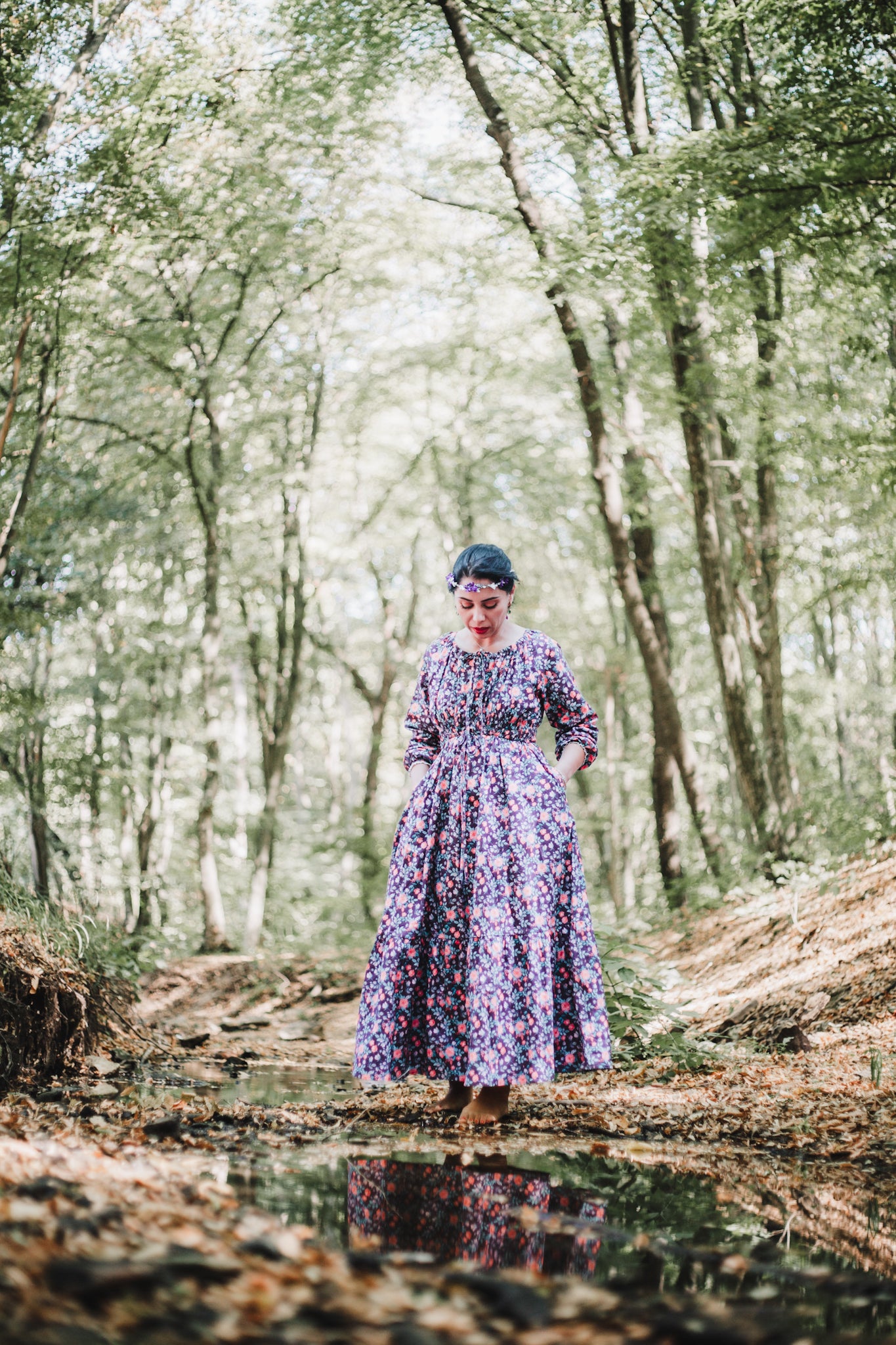 Woman in modest nursing floral dress outdoors