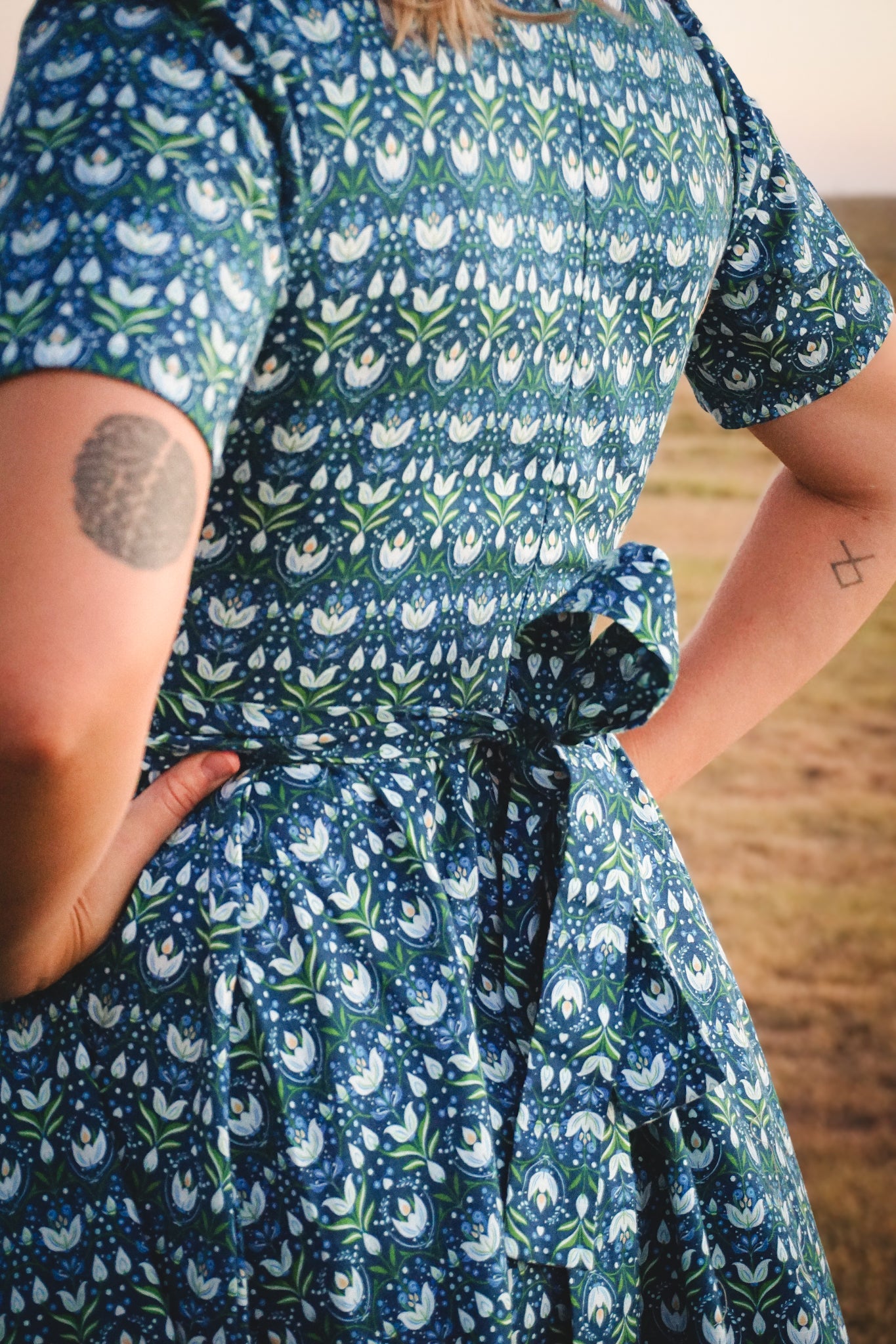 Woman in modest nursing dress with pockets