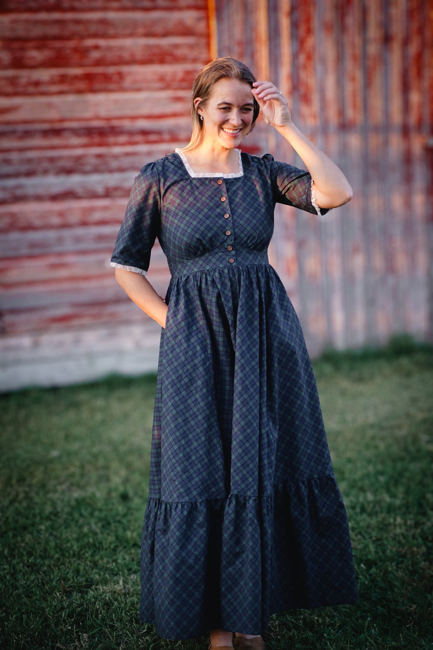 woman wearing a modest nursing blue patterned dress