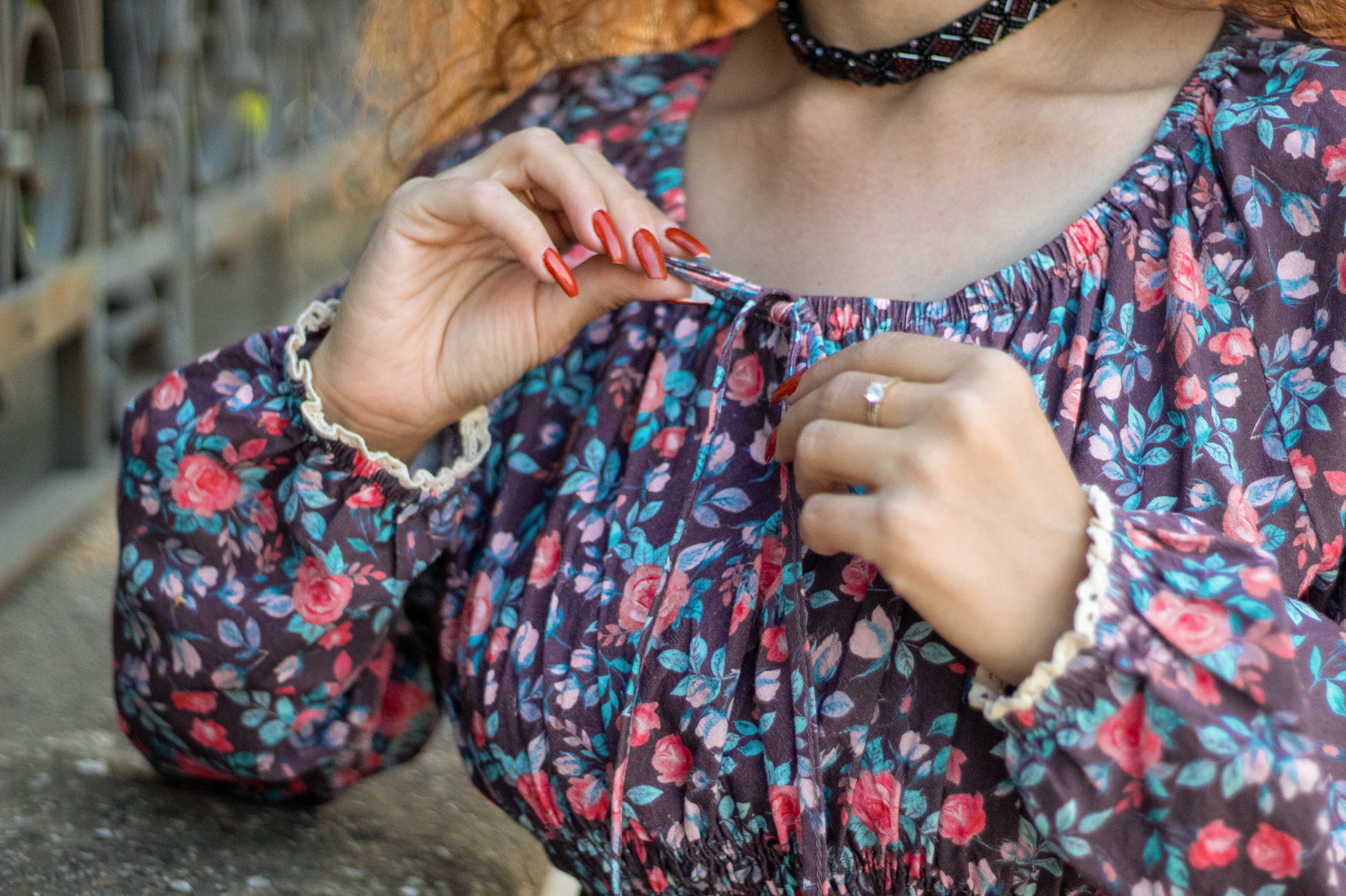 Woman in modest nursing floral dress outdoors