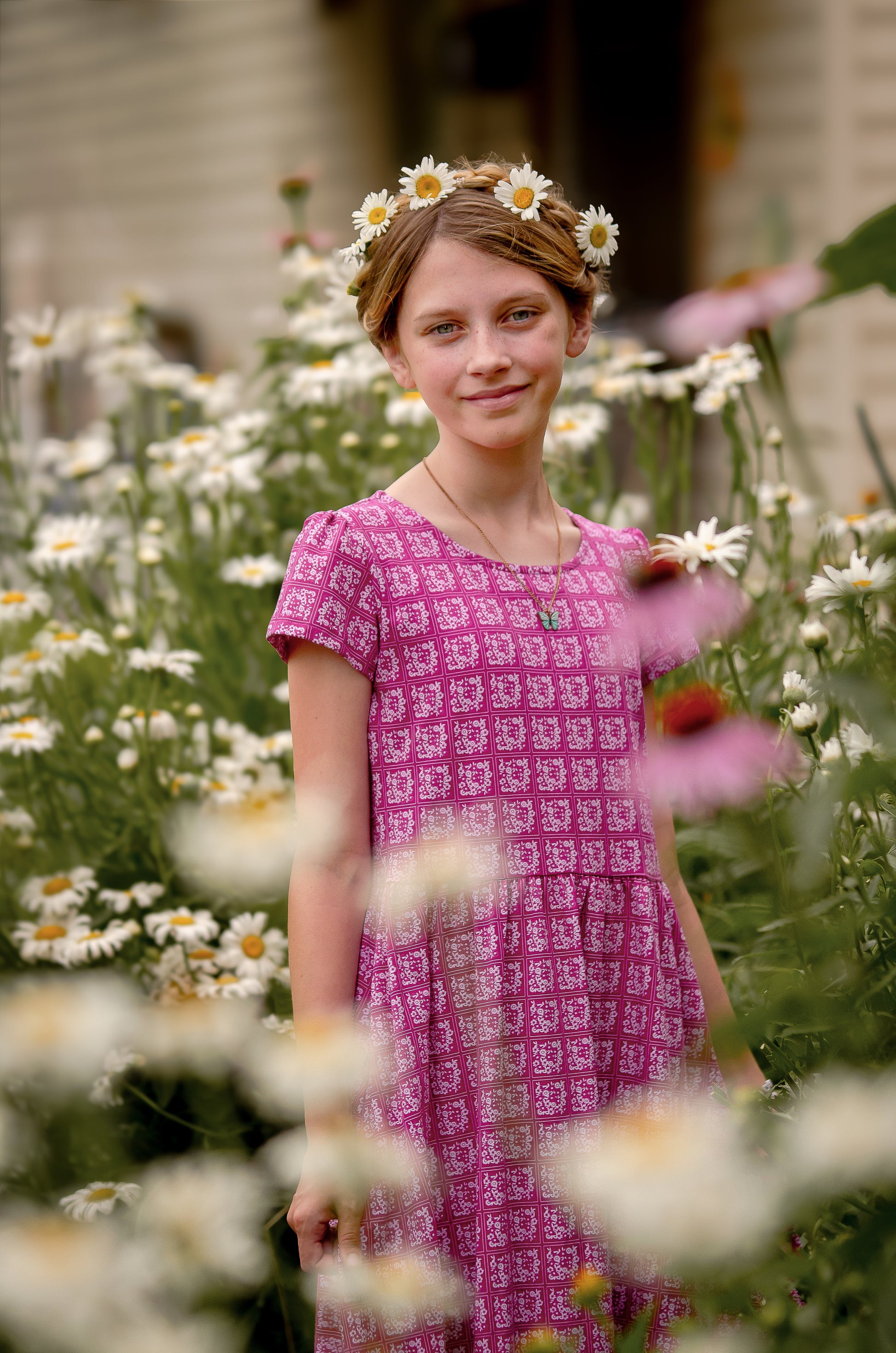 Young girl in a modest pink dress