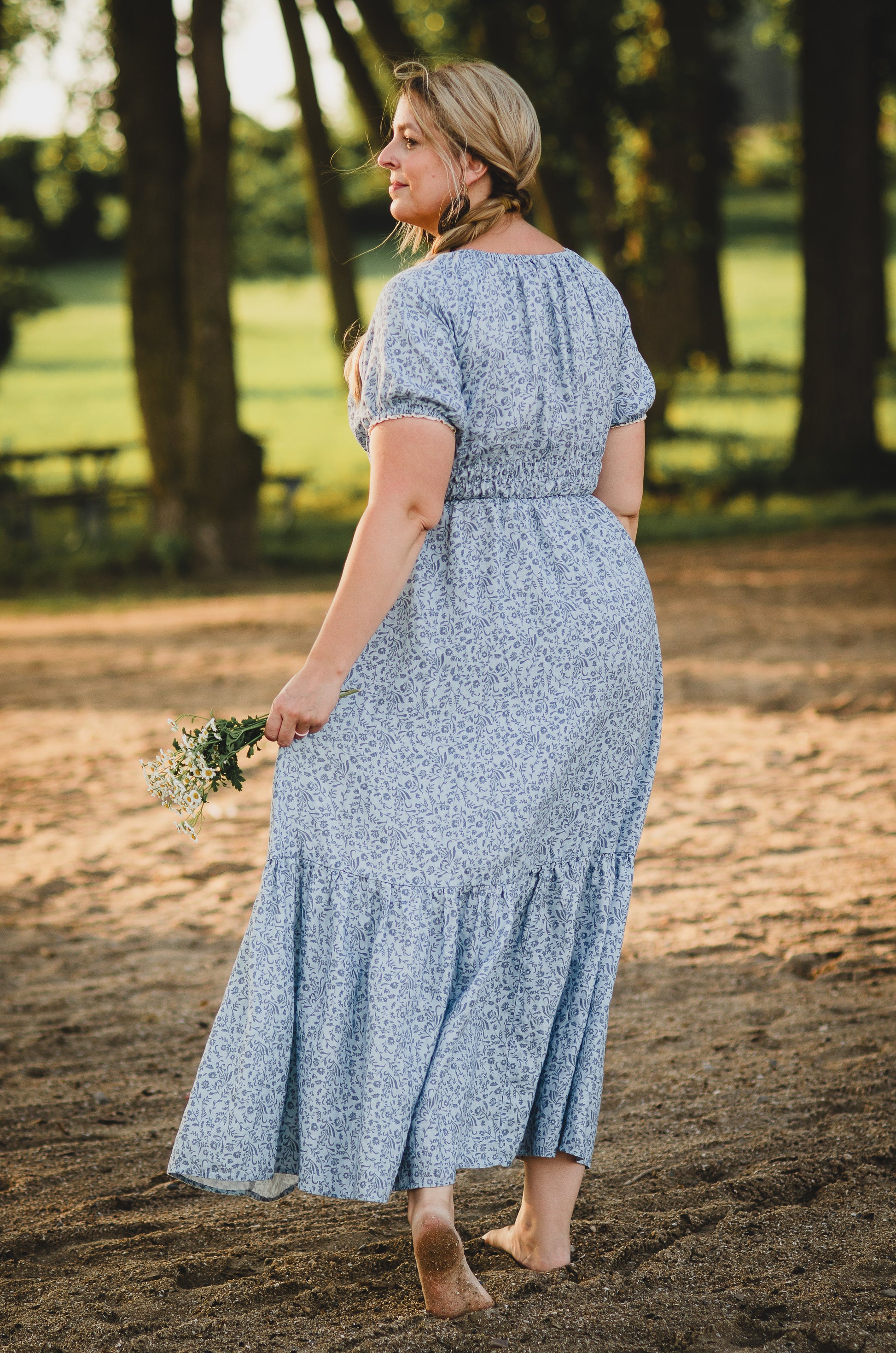 woman in a modest blue nursing dress
