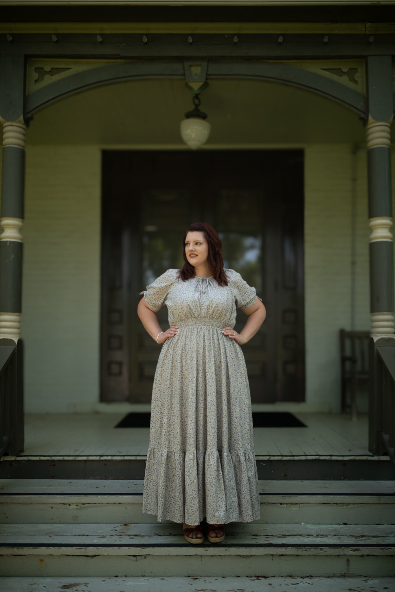 woman in patterned modest nursing dress