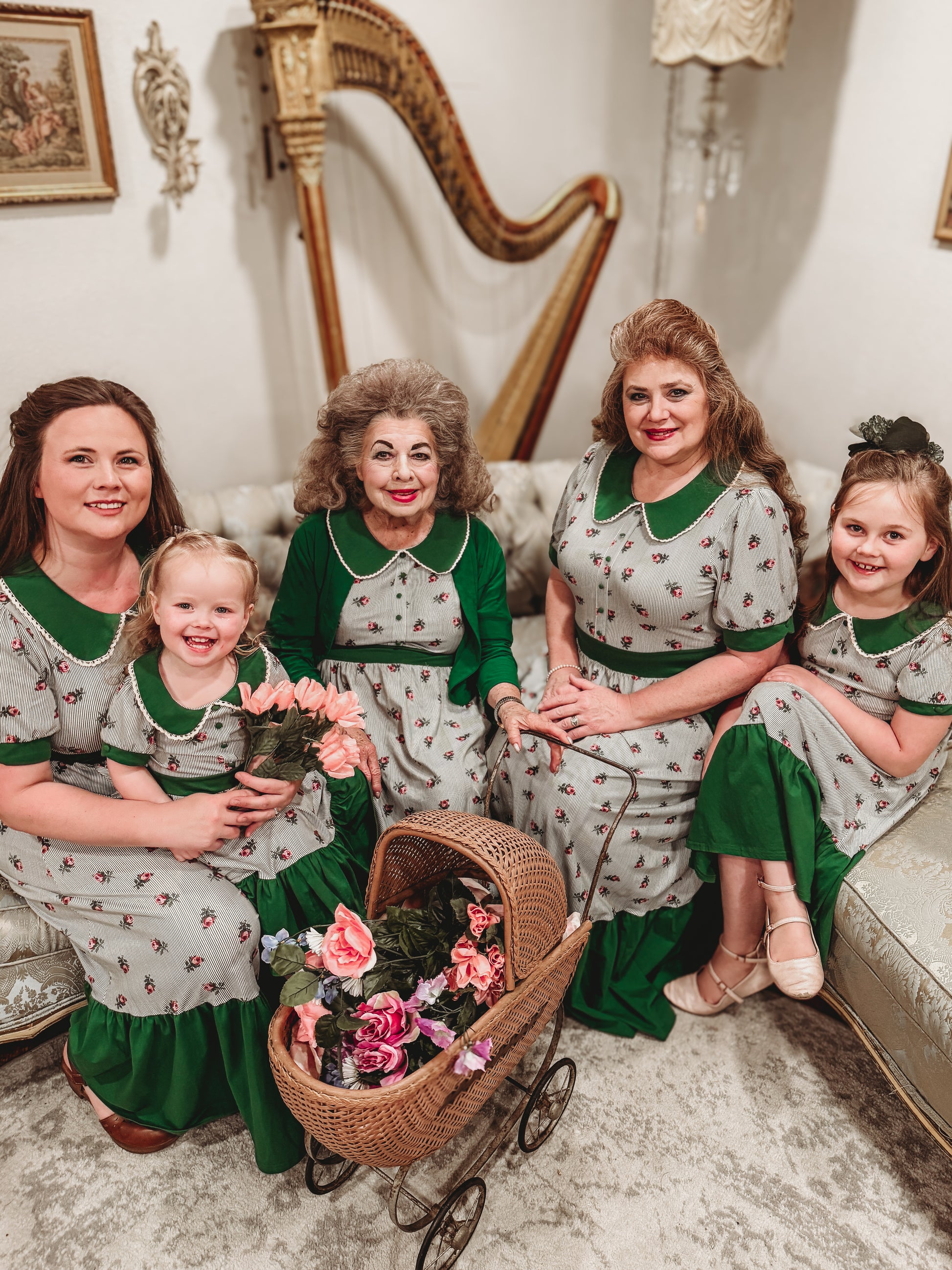 women and young girls wearing green and white striped modest nursing dresses