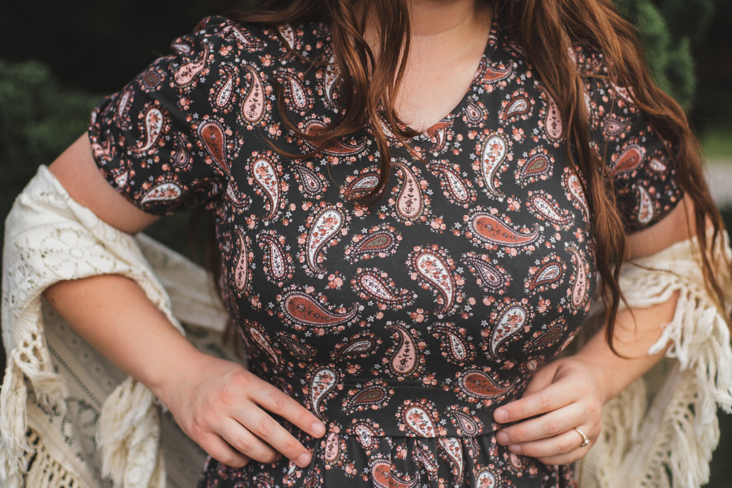 woman wearing a modest nursing floral dress