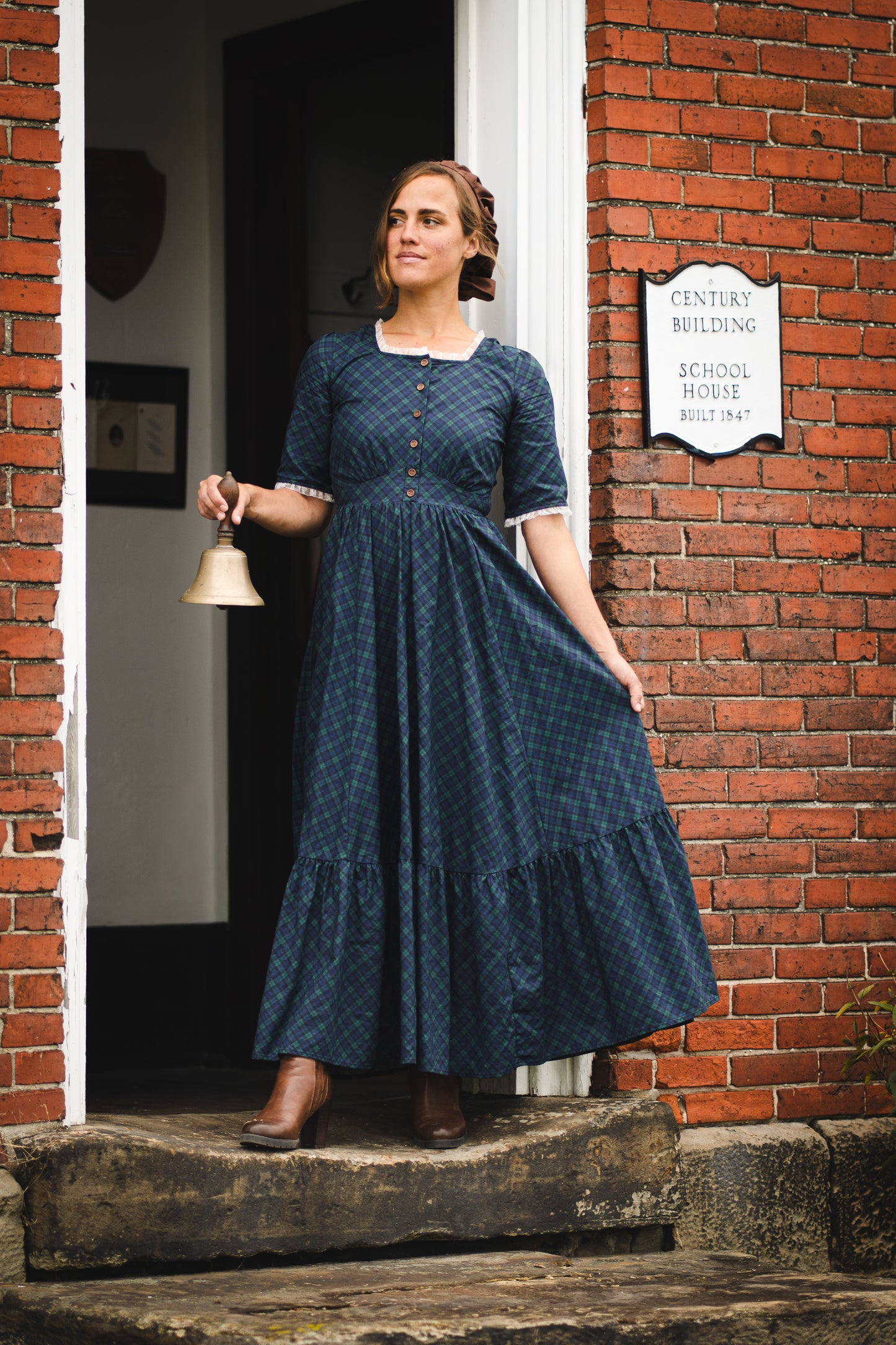 woman wearing a modest nursing blue patterned dress