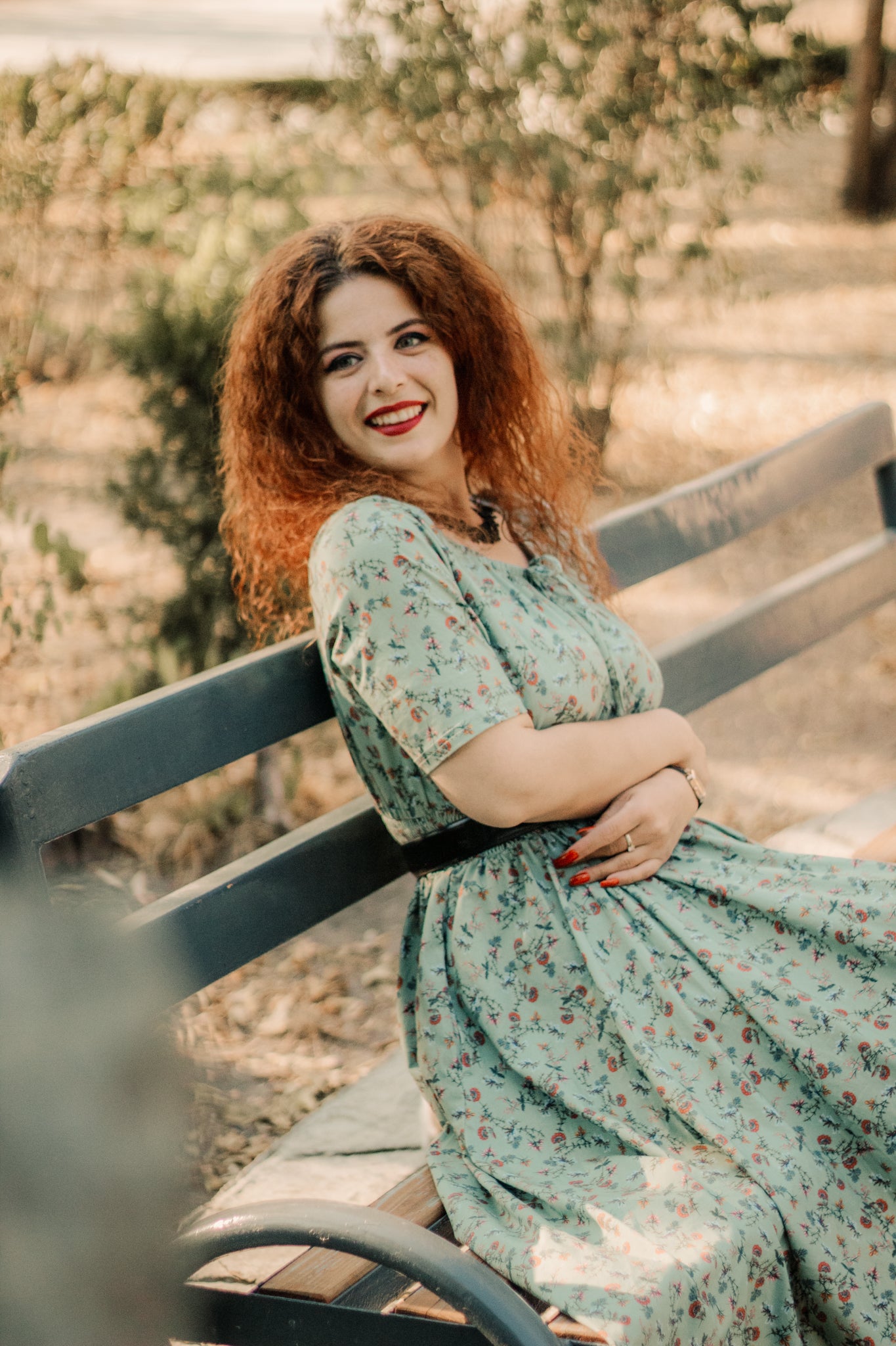 Woman in modest nursing floral dress outdoors